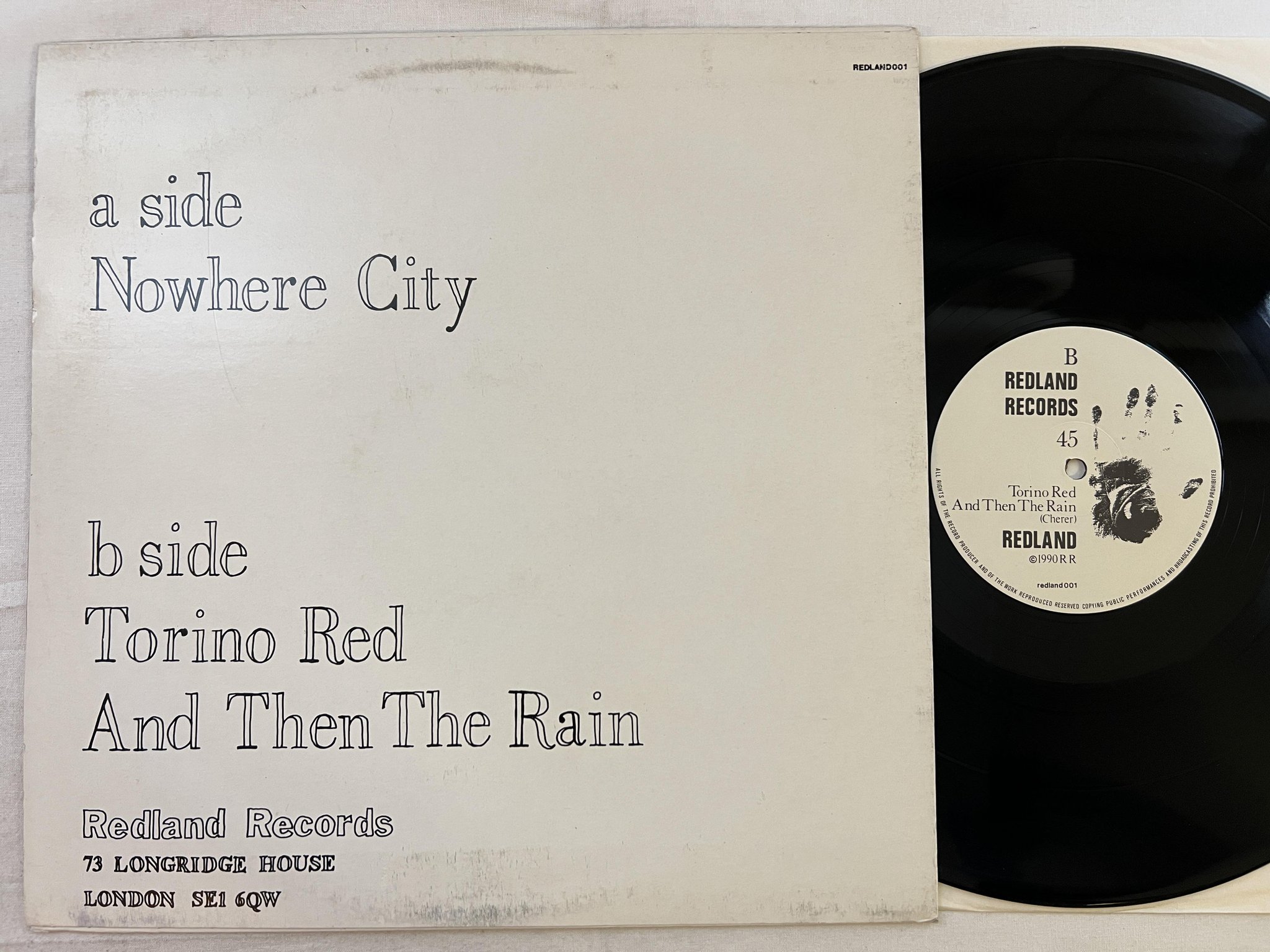 Omslagsbild för skivan REDLAND nowhere city 12" -90 UK REDLAND 001 *** INDIE ***