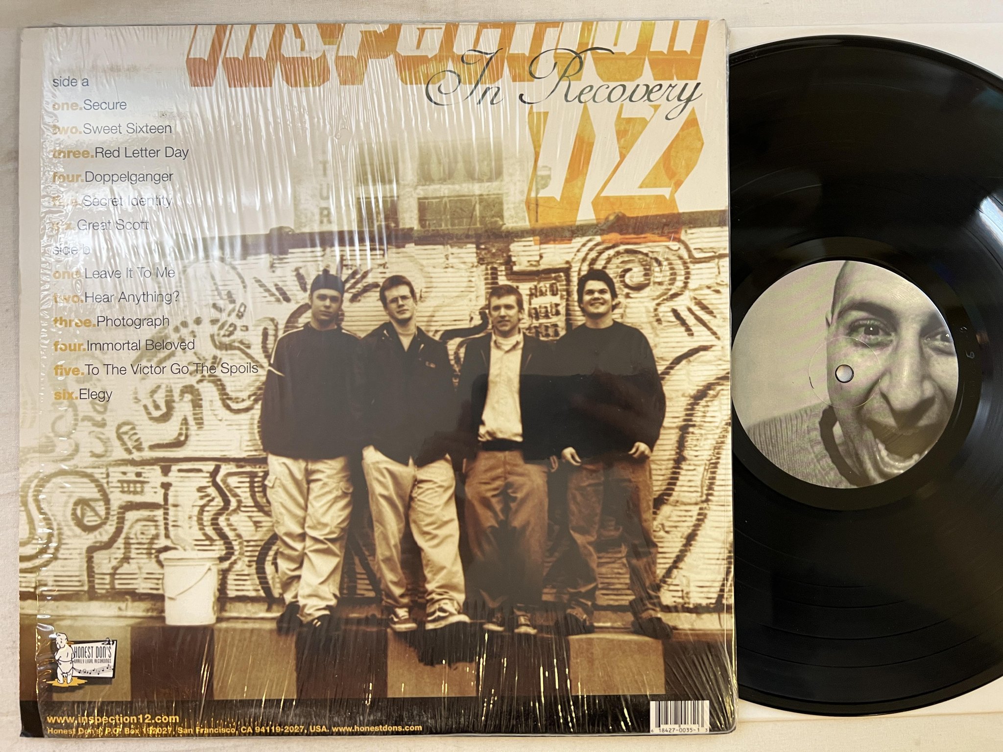 Omslagsbild för skivan INSPECTION 12 In Recovery LP 2001 US HONEST DON'S DON035-1