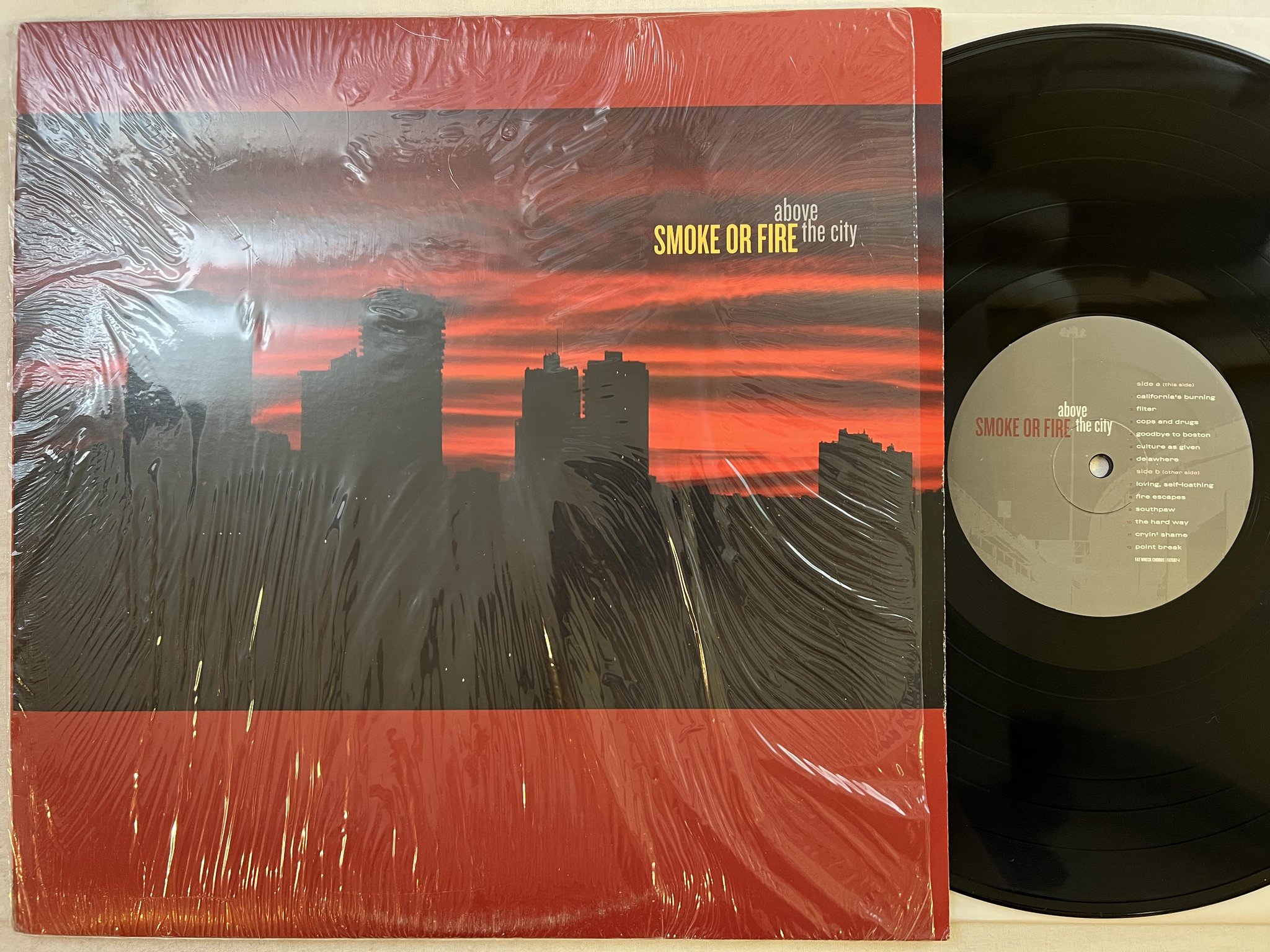 Omslagsbild för skivan SMOKE OR FIRE Above The City LP 2005 US fat wreck chords FAT687-1