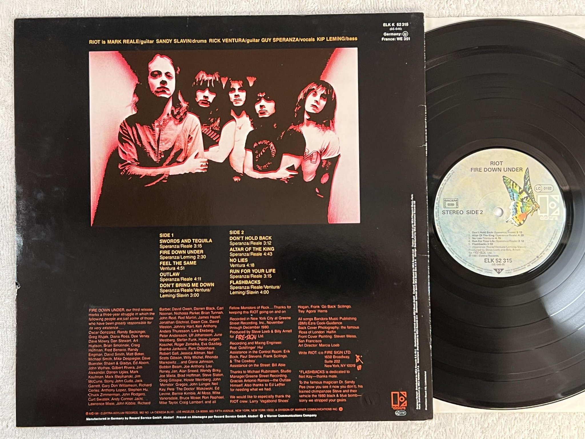 Omslagsbild för skivan RIOT fire down under LP -81 Fra ELEKTRA ELK 52315