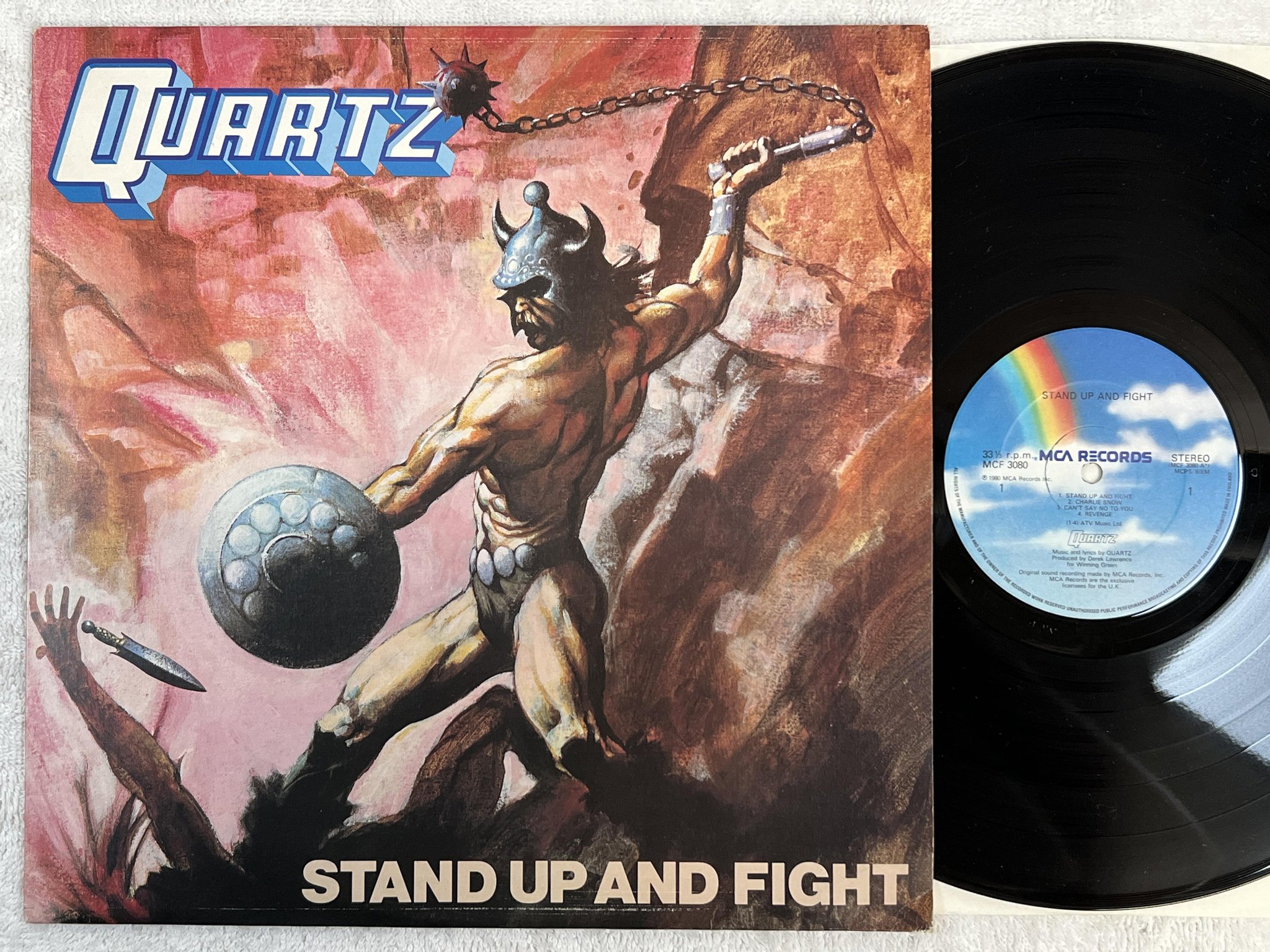Omslagsbild för skivan QUARTZ stand up and fight LP -80 UK MCA 3080