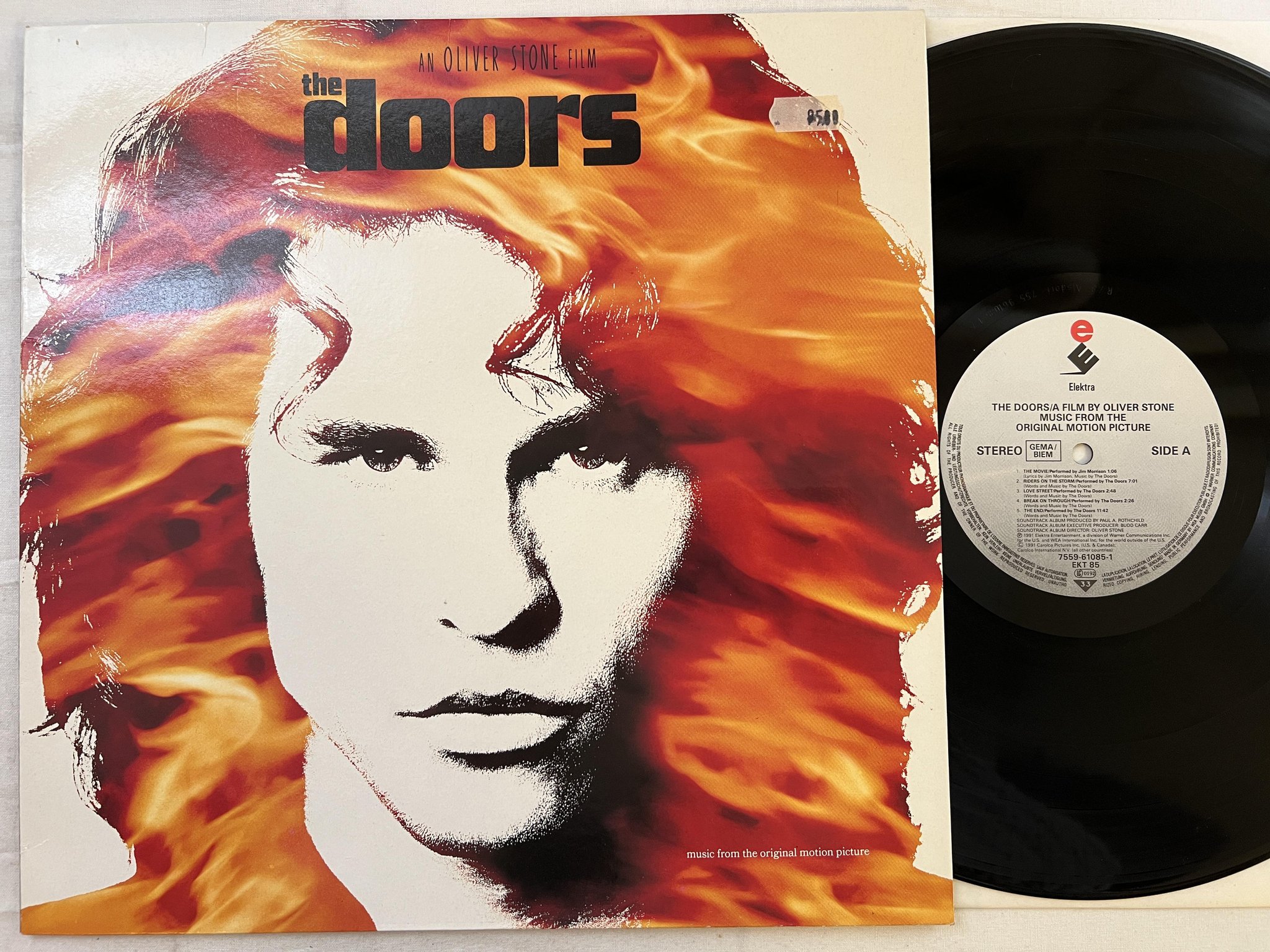 Omslagsbild för skivan THE DOORS LP -91 Ger ELEKTRA 7559-61085-1 SOUNDTRACK ** OLIVER STONE **