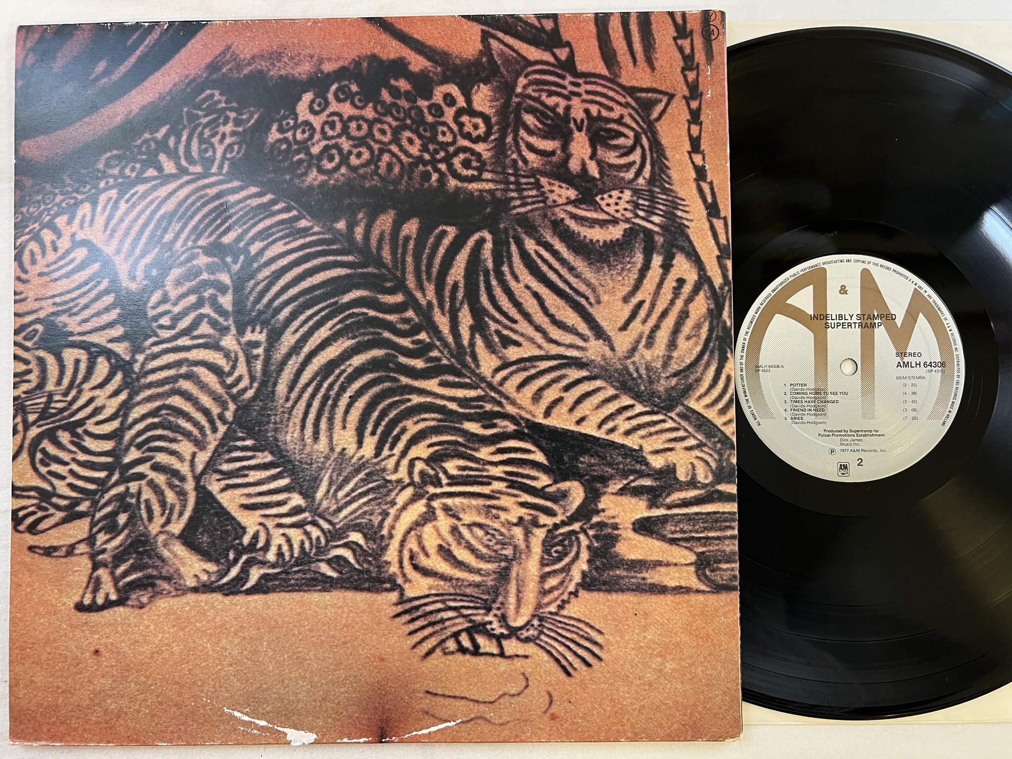 Omslagsbild för skivan SUPERTRAMP indelibly stamped LP -77 Hol A&M AMLH 64306