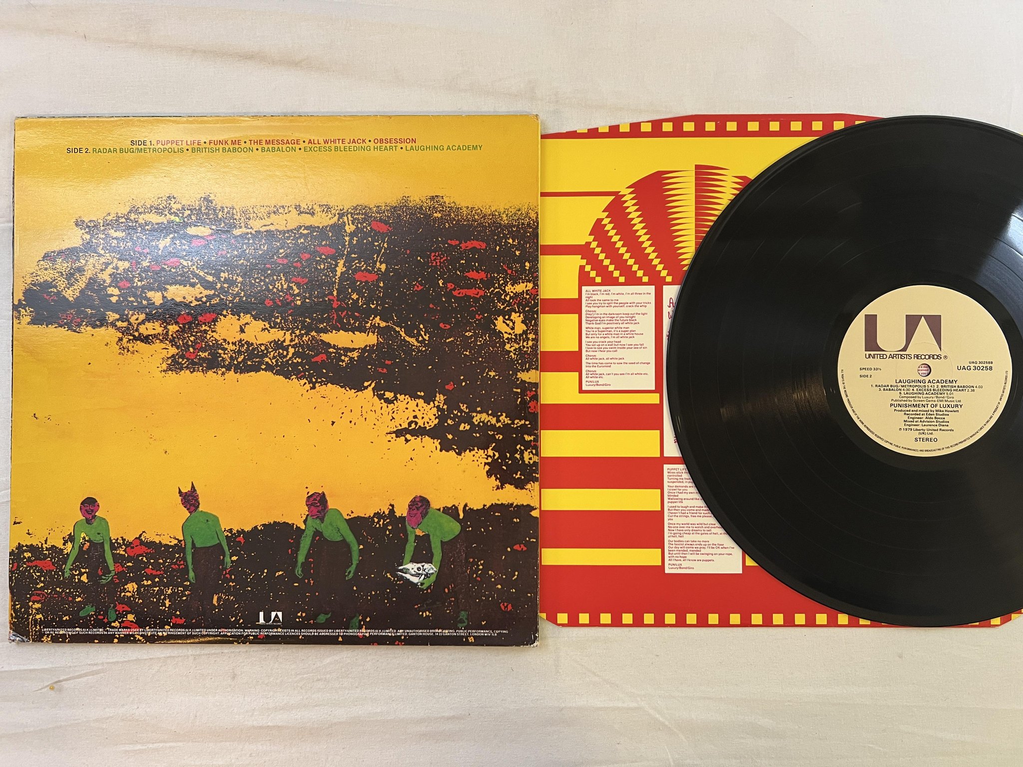 Omslagsbild för skivan PUNISHMENT OF LUXURY Laughing Academy LP -79 UK UNITED UAG 30258