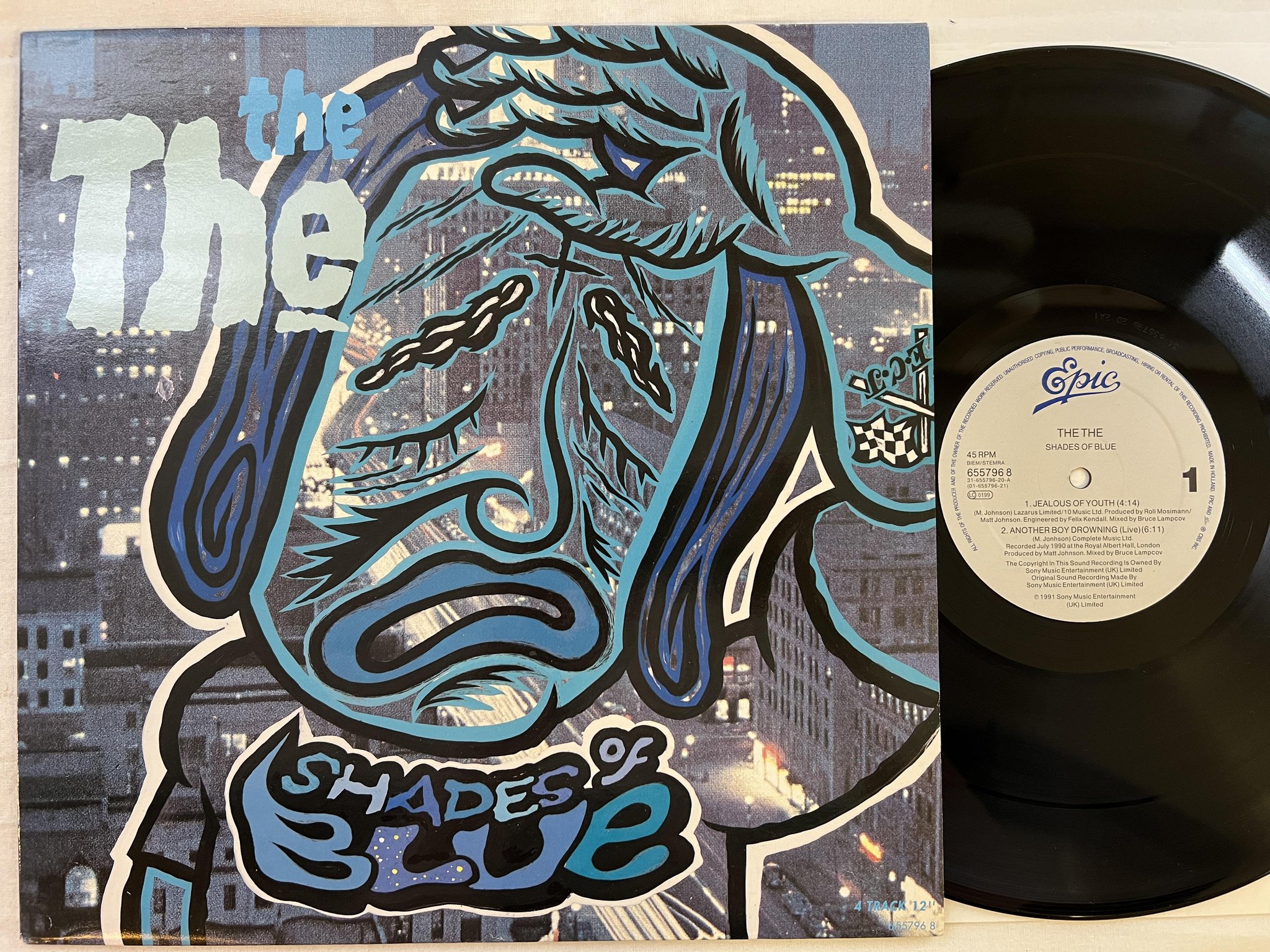 Omslagsbild för skivan THE THE Shades Of Blue 12" -91 EPIC 655796 8
