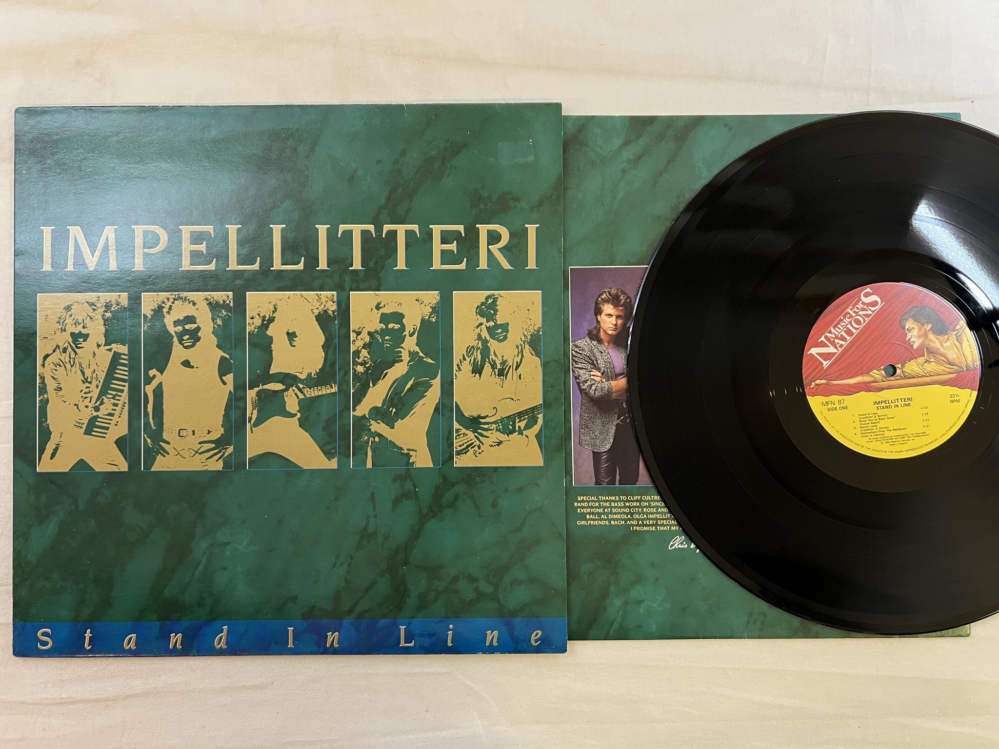 Omslagsbild för skivan IMPELLITTERI stand in line LP -88 UK MUSIC FOR NATIONS MFN 87