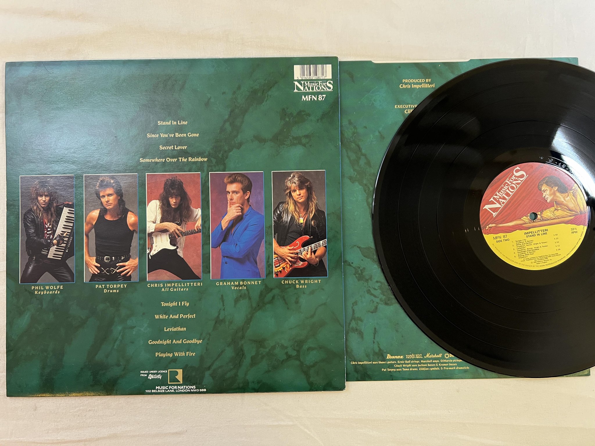 Omslagsbild för skivan IMPELLITTERI stand in line LP -88 UK MUSIC FOR NATIONS MFN 87