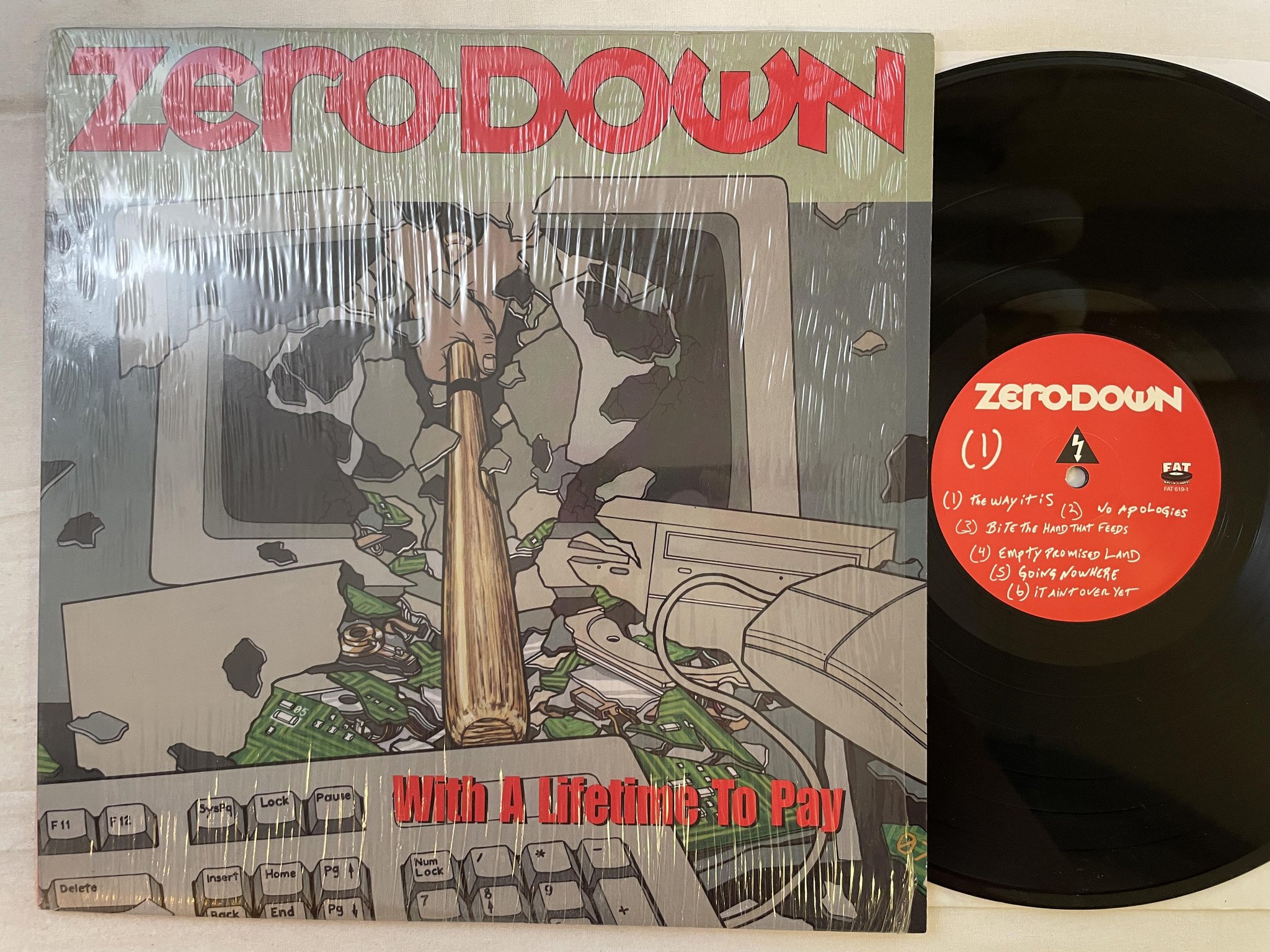 Omslagsbild för skivan ZERO DOWN With A Lifetime To Pay LP 2001 US FAT WRECK *** RARE PUNK LP ***