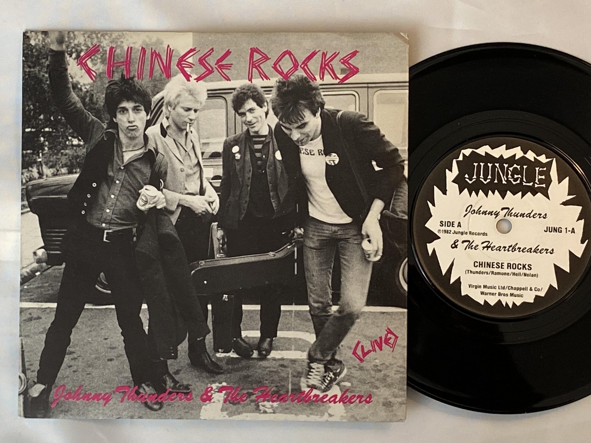 Omslagsbild för skivan JOHNNY THUNDERS & THE HEARTBREAKERS Chinese Rocks 7" -82 JUNGLE JUNG 1