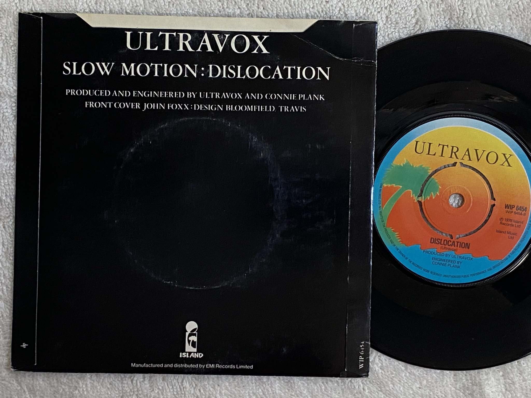 Omslagsbild för skivan ULTRAVOX slow motion 7" -78 UK ISLAND WIP 6454