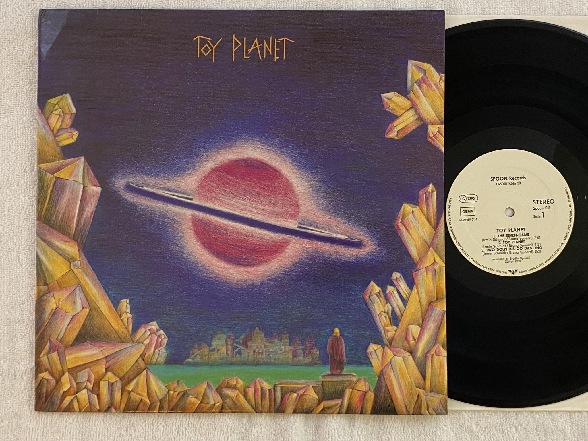 Omslagsbild för skivan IRMIN SCHMIDT & BRUNO SPOERRI Toy Planet LP -81 SPOON 011