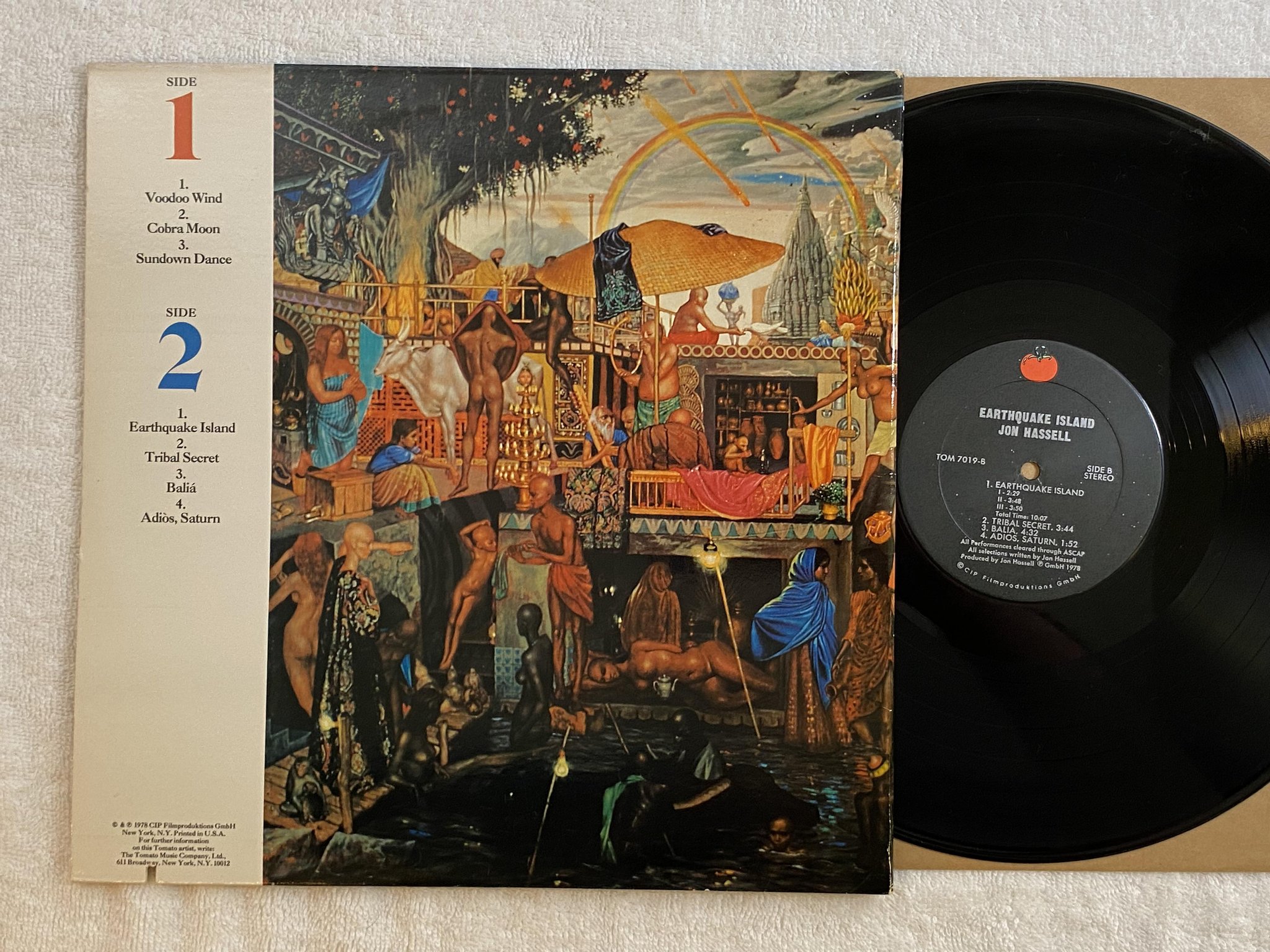 Omslagsbild för skivan JON HASSELL Earthquake Island LP -78 US tomato tom-7019