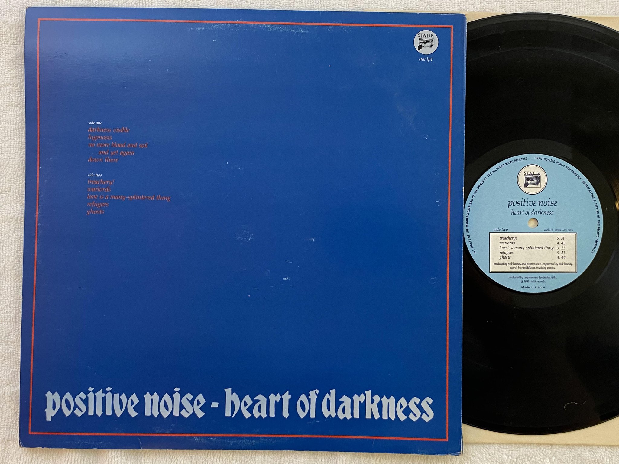 Omslagsbild för skivan POSITIVE NOISE heart of darkness LP -81 STATIK stat lp1 *** new wave ***