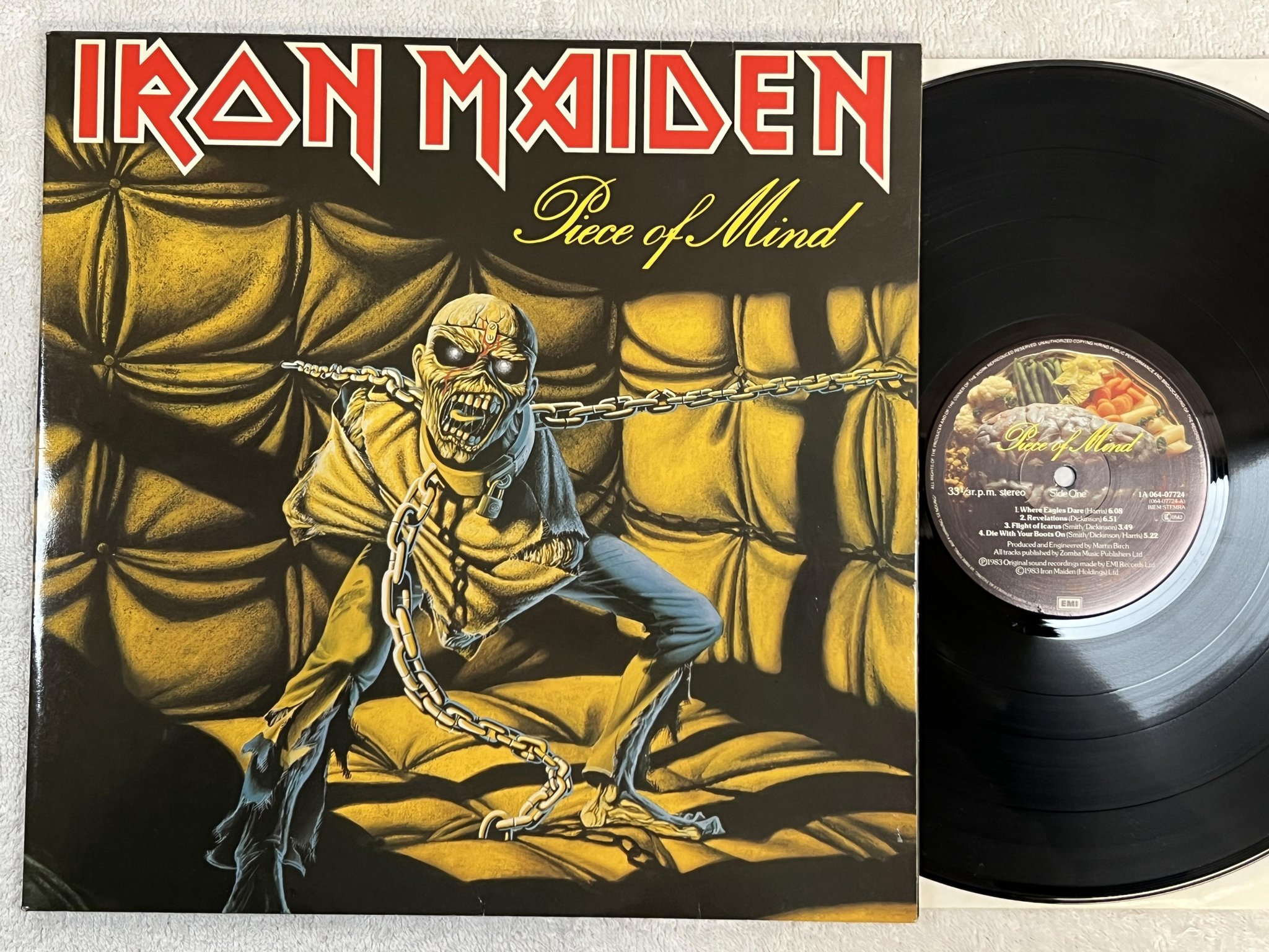 Omslagsbild för skivan IRON MAIDEN piece of mind LP -83 EMI 1A 064-07724