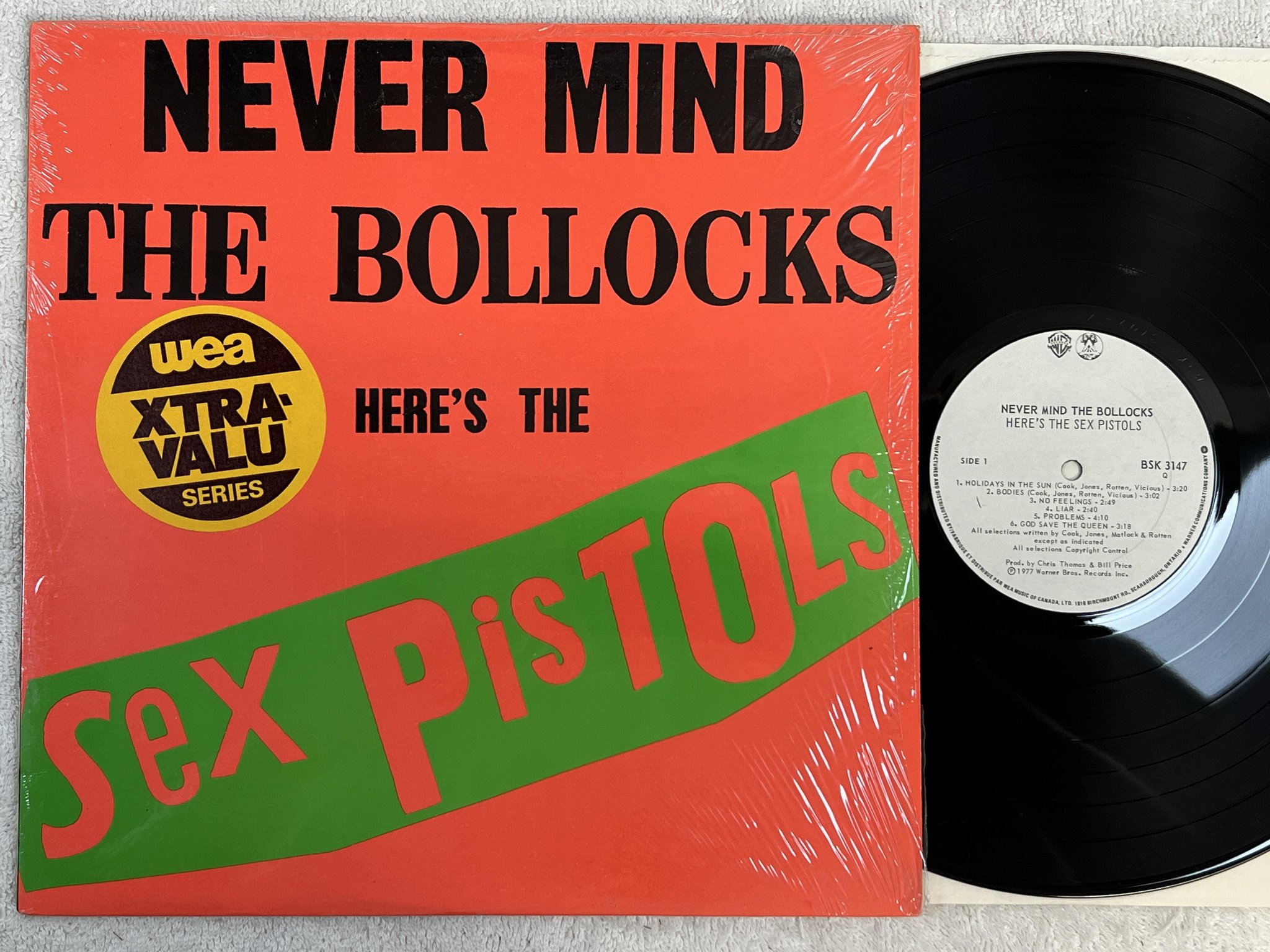 Omslagsbild för skivan SEX PISTOLS never mind the bollocks LP -77 Can WARNER BSK 3147
