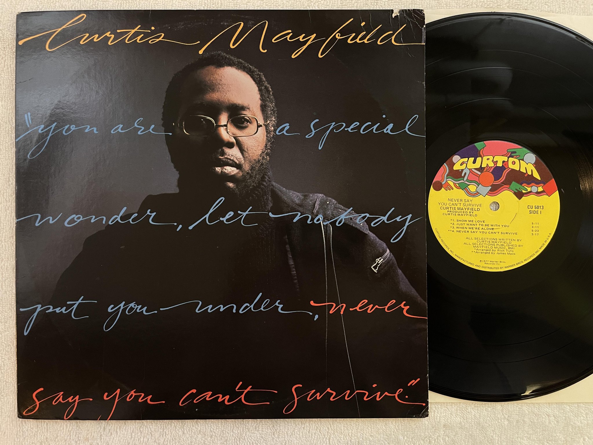 Omslagsbild för skivan CURTIIS MAYFIELD never say you can't survive LP -77 US CURTOM CU 5013
