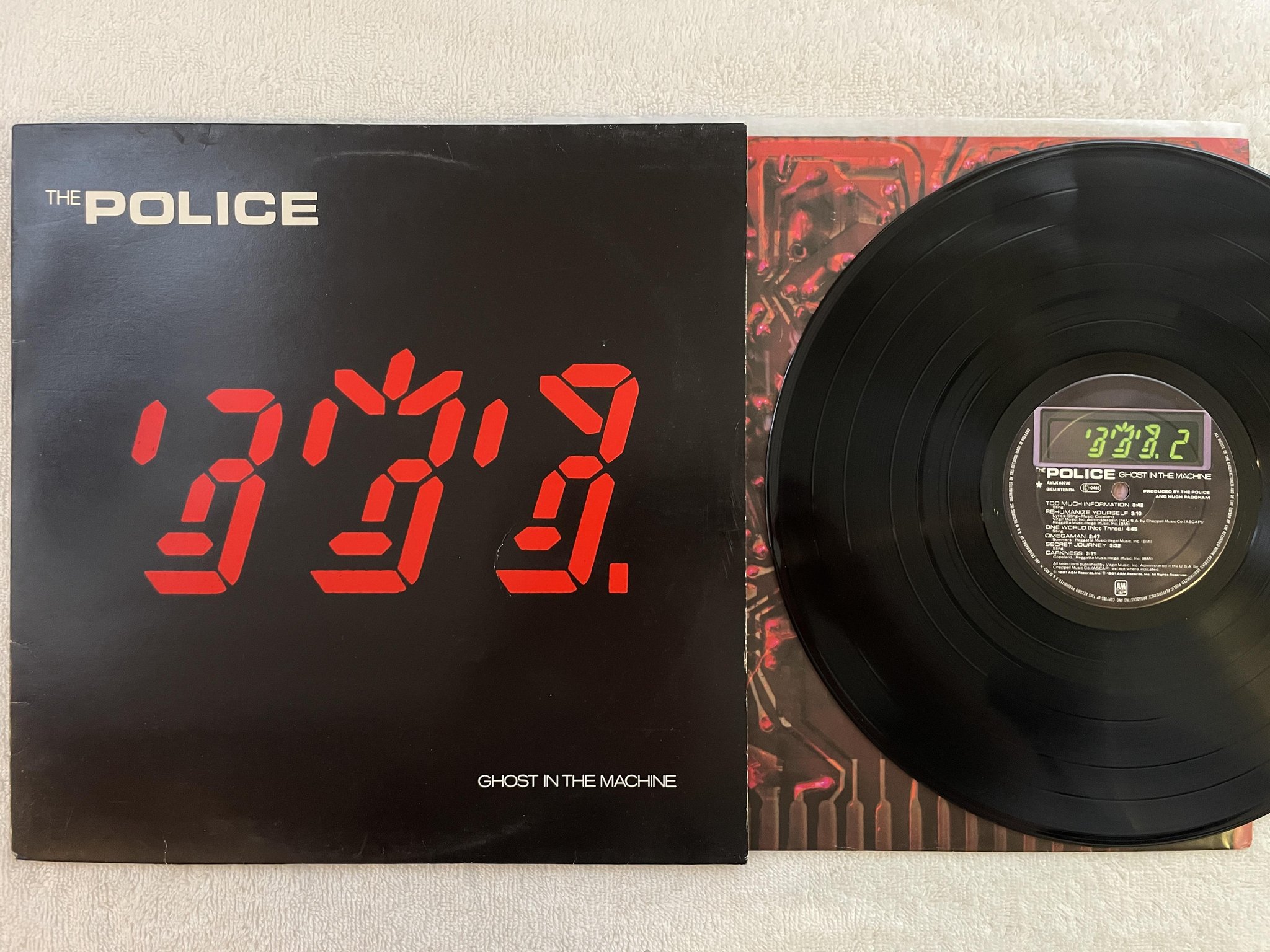 Omslagsbild för skivan THE POLICE ghost in the machine LP -81 A&M AMLK 63730