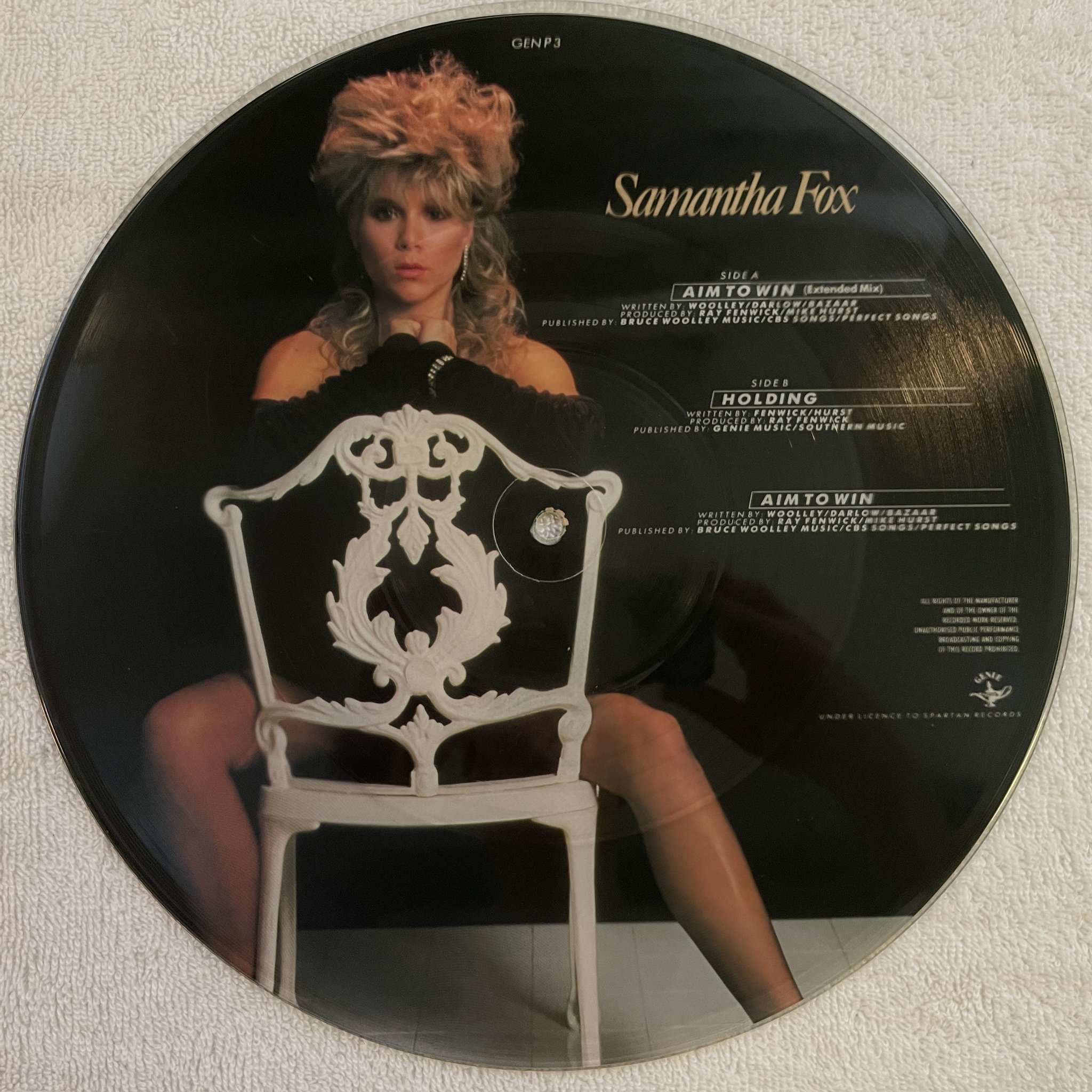 Omslagsbild för skivan SAMANTHA FOX Aim To Win 12" picture disc GENIE MUSIC GEN P3