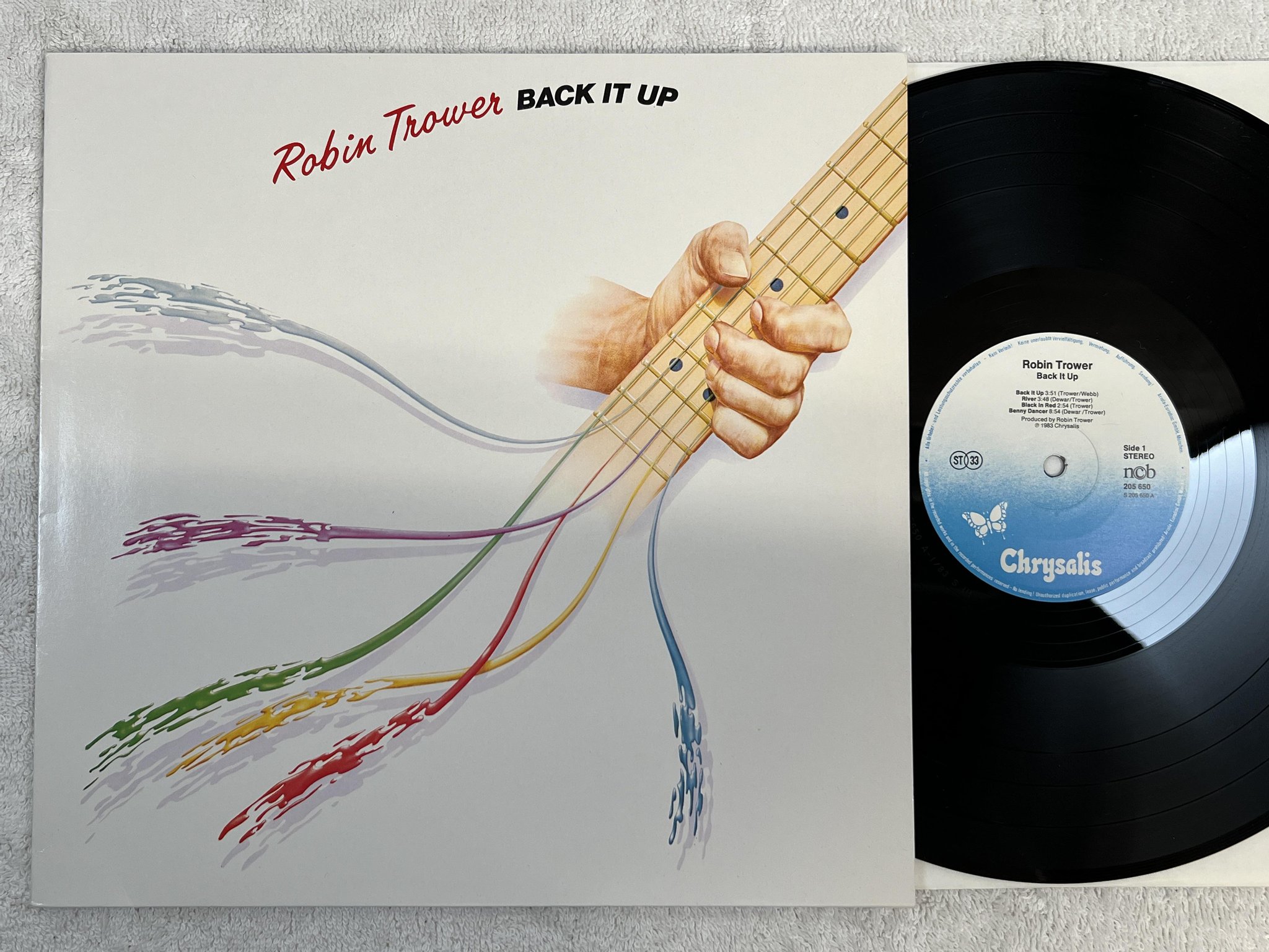 Omslagsbild för skivan ROBIN TROWER Back It Up LP -83 CHRYSALIS 205 650