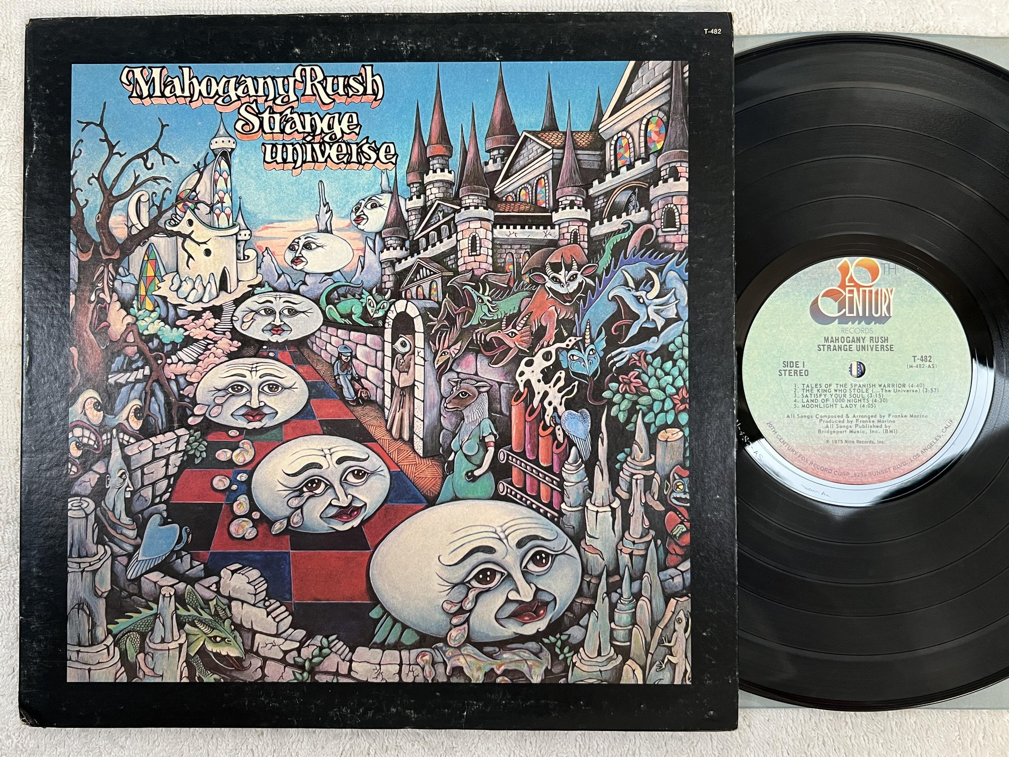 Omslagsbild för skivan MAHOGANY RUSH strange universe LP -75 US 20TH CENTURY T-482