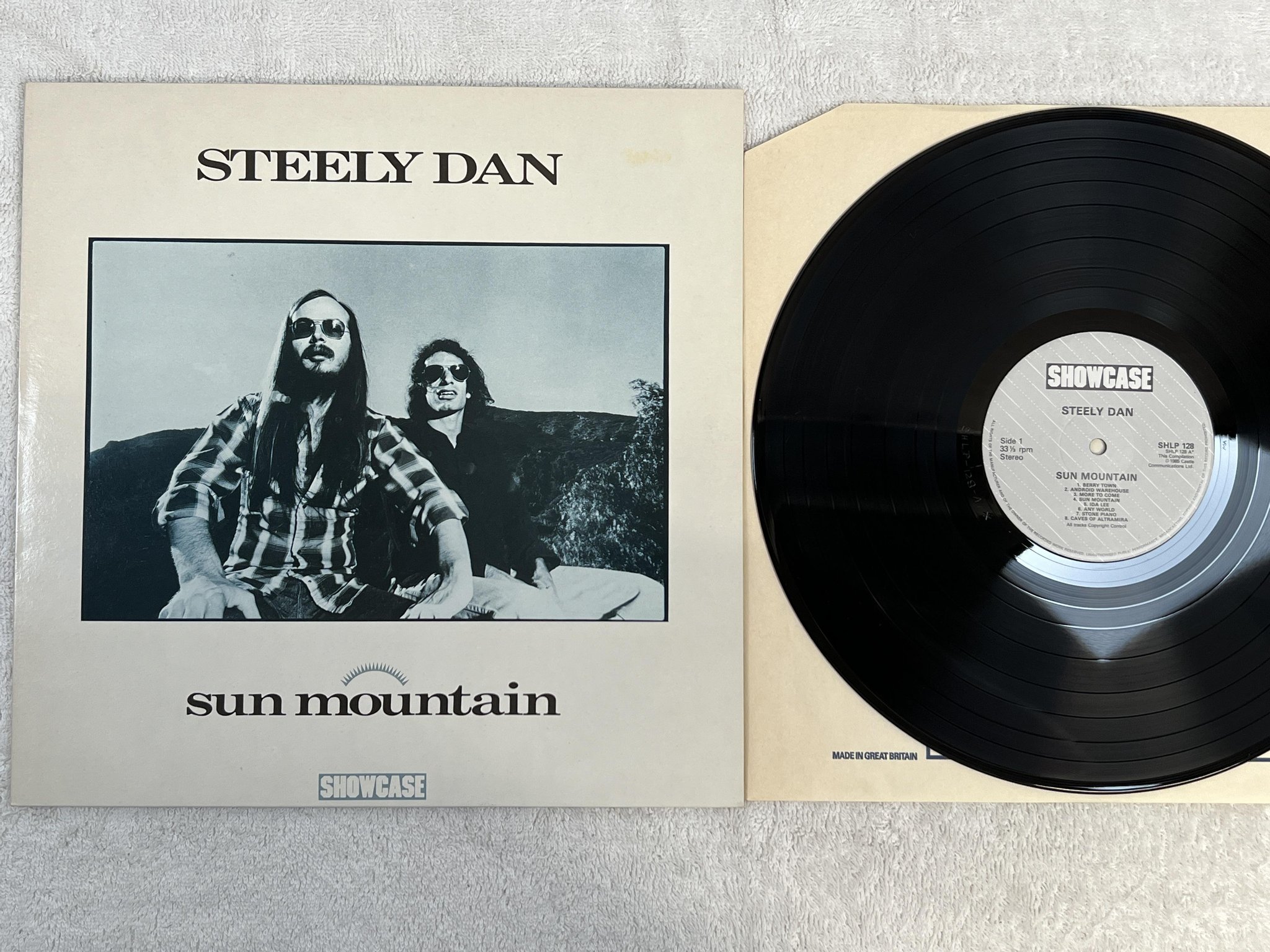 Omslagsbild för skivan STEELY DAN Sun Mountain LP -85 SHOWCASE SHLP 128