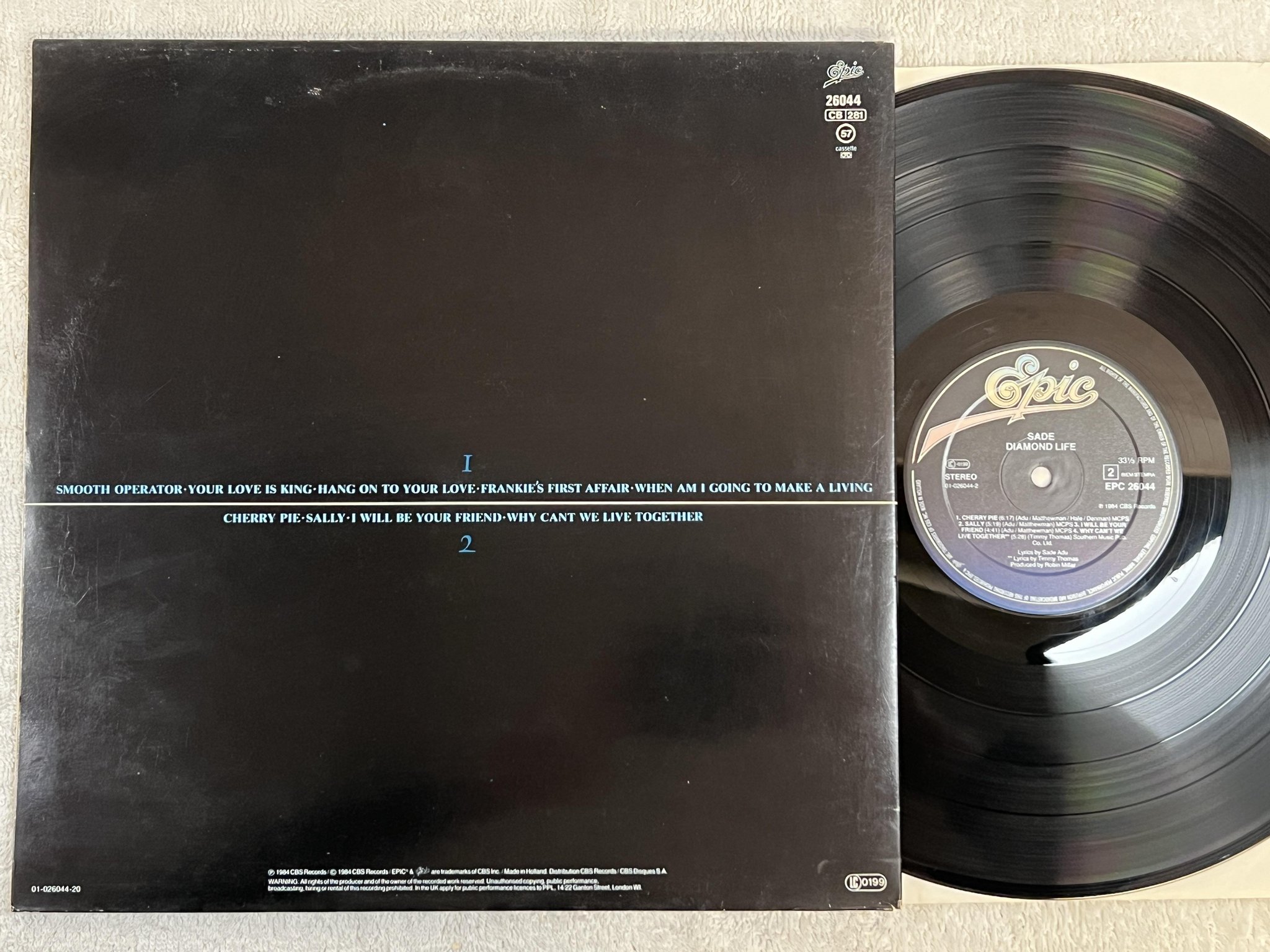 Omslagsbild för skivan SADE diamond life LP -84 Hol EPIC EPC 26044