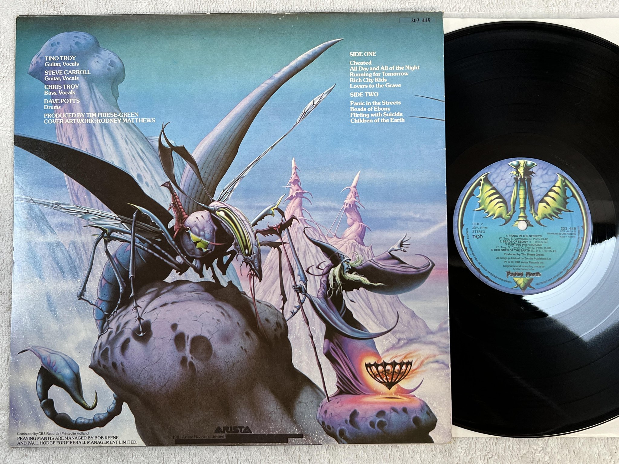Omslagsbild för skivan PRAYING MANTIS time tells no lies LP -81 ncb ARISTA 203449