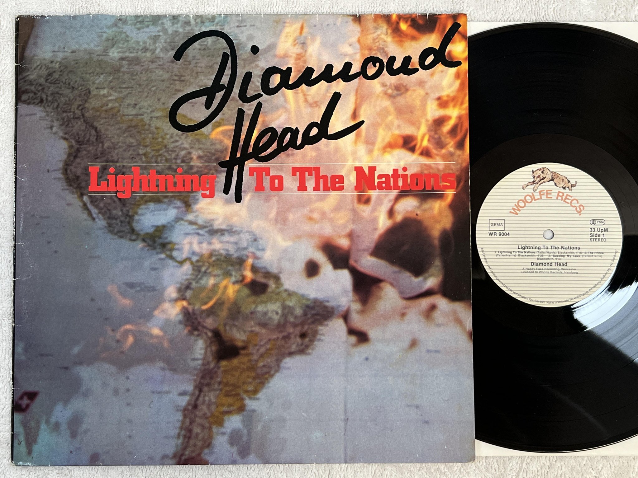 Omslagsbild för skivan DIAMOND HEAD lightning to the nations LP -81 Ger WOOLFW RECS WR 9004 *** RARE **