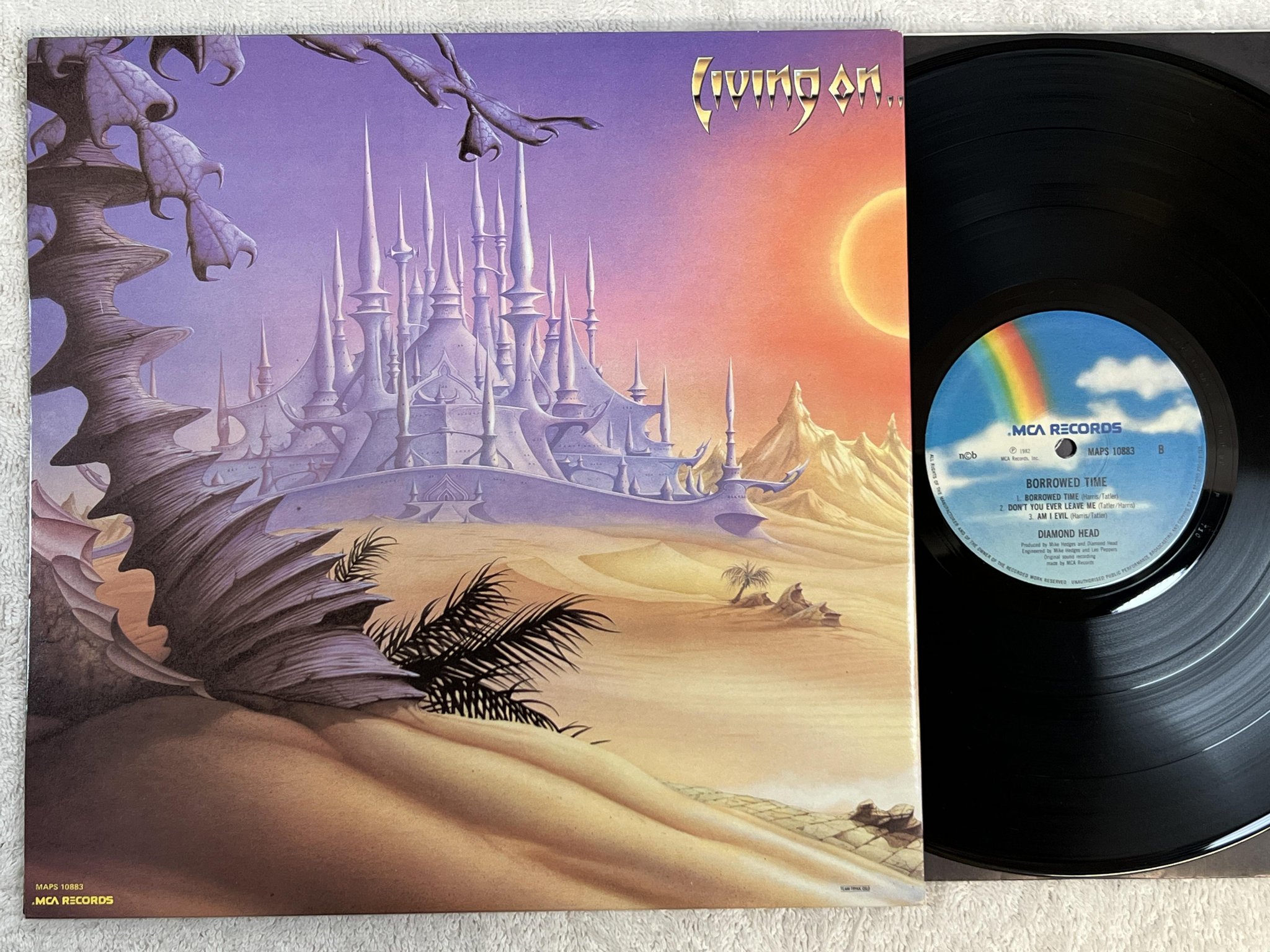 Omslagsbild för skivan DIAMOND HEAD borrowed time LP -82 ncb MCA MAPS 10883