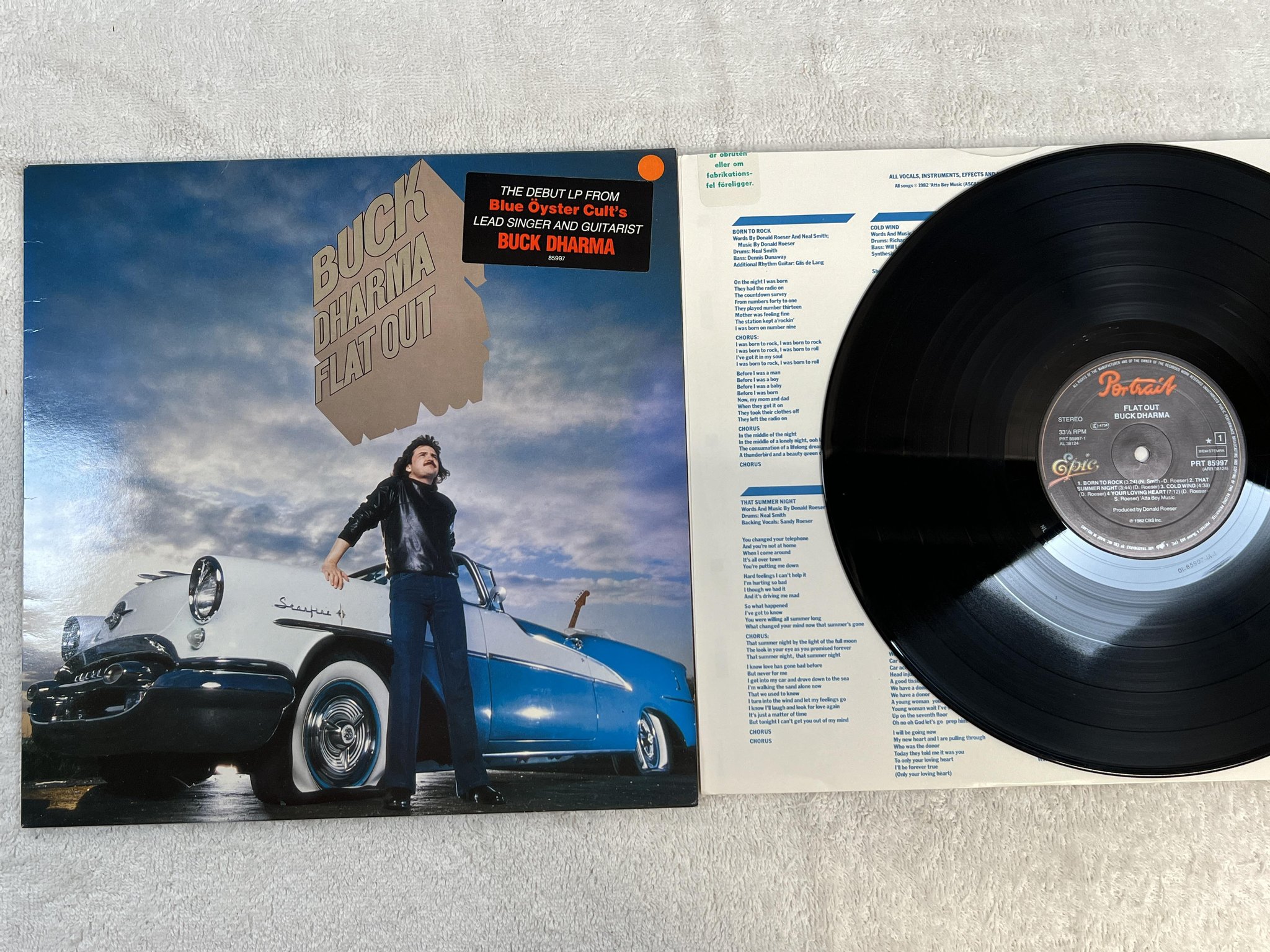 Omslagsbild för skivan BUCK DHARMA flat out LP -82 Hol PORTRAIT PRT 85997