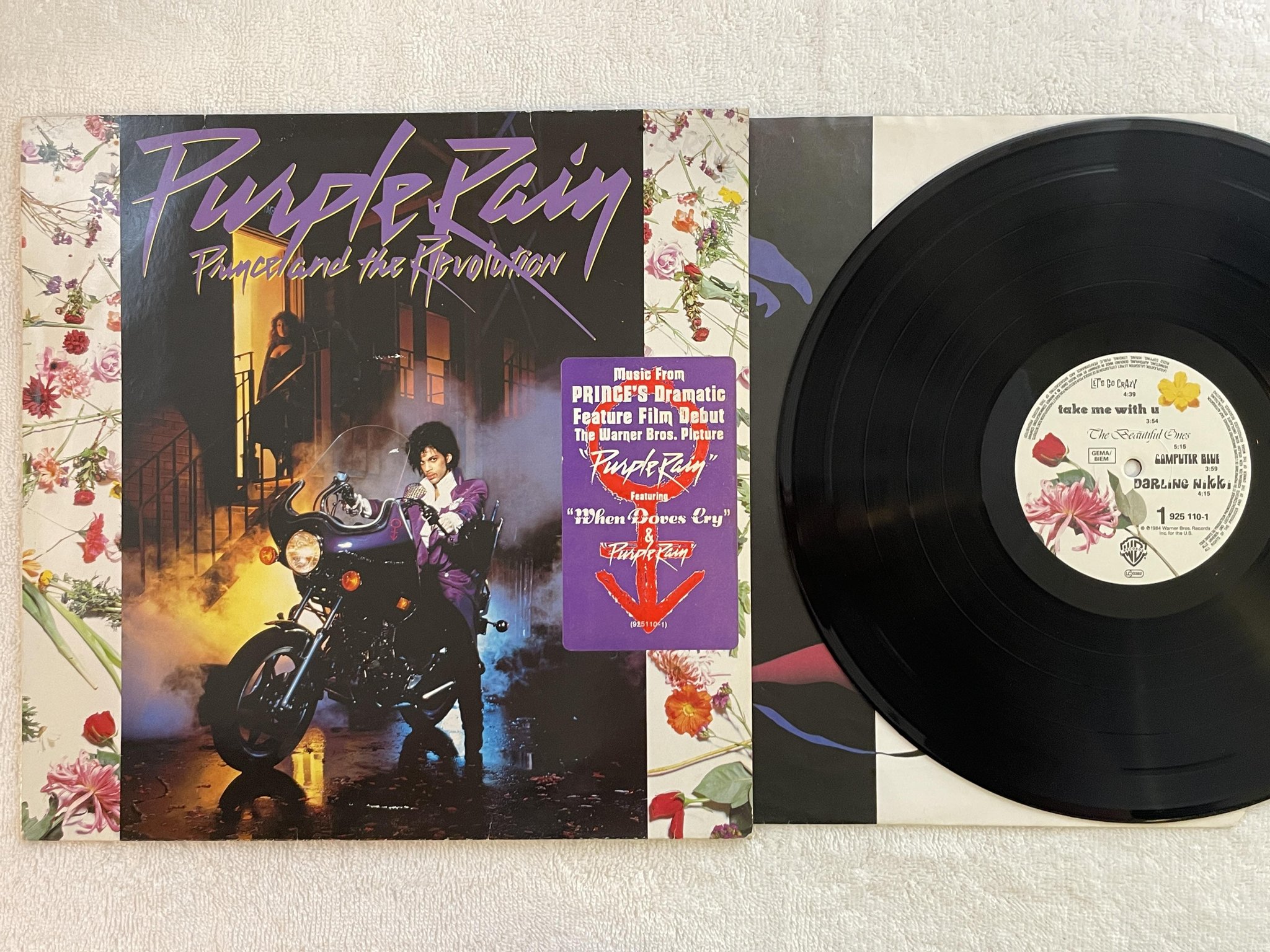 Omslagsbild för skivan PRINCE purple rain LP -84 Ger WARNER BROS 925 110-1 *** W/ POSTER ***