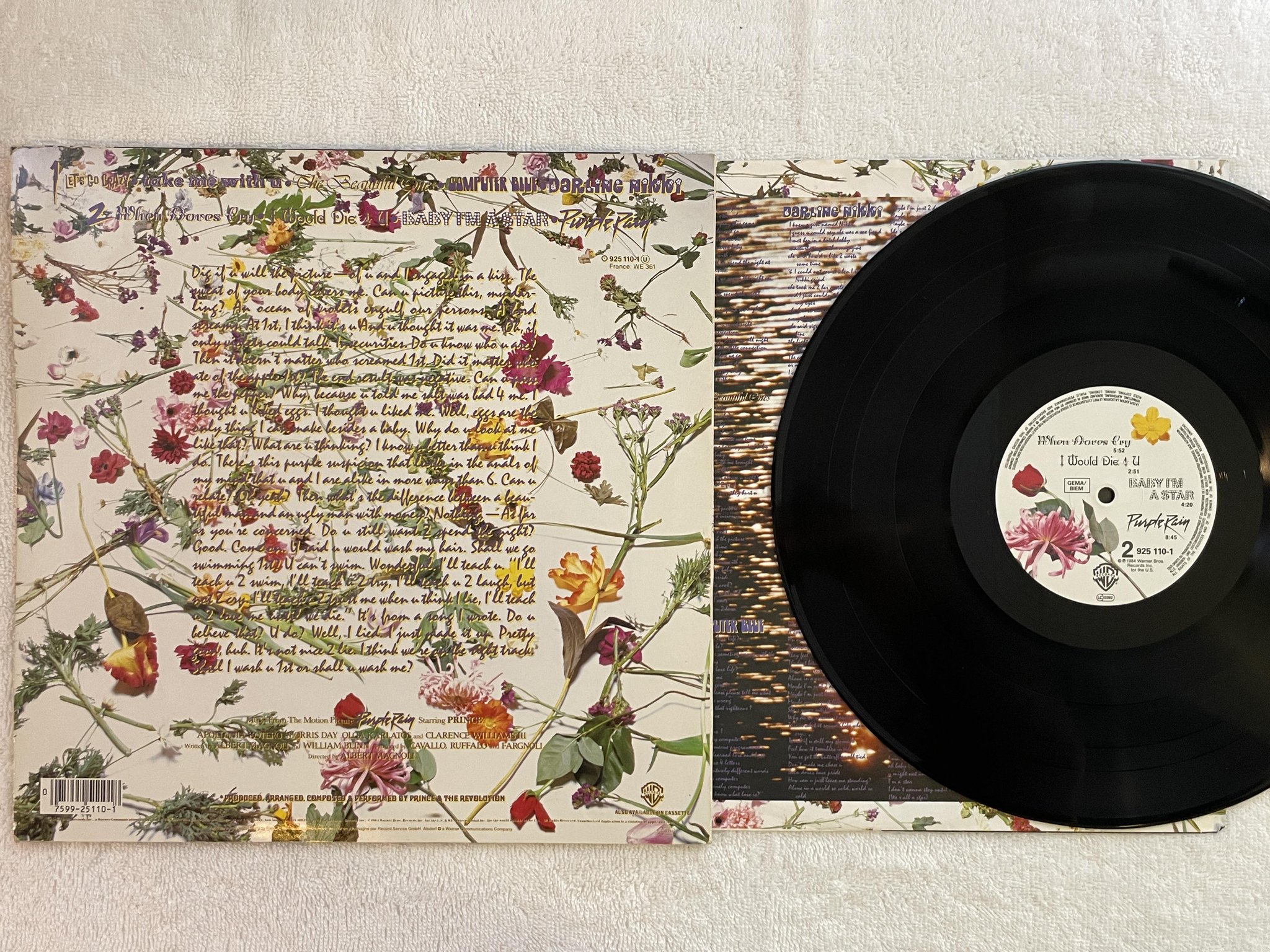 Omslagsbild för skivan PRINCE purple rain LP -84 Ger WARNER BROS 925 110-1 *** W/ POSTER ***