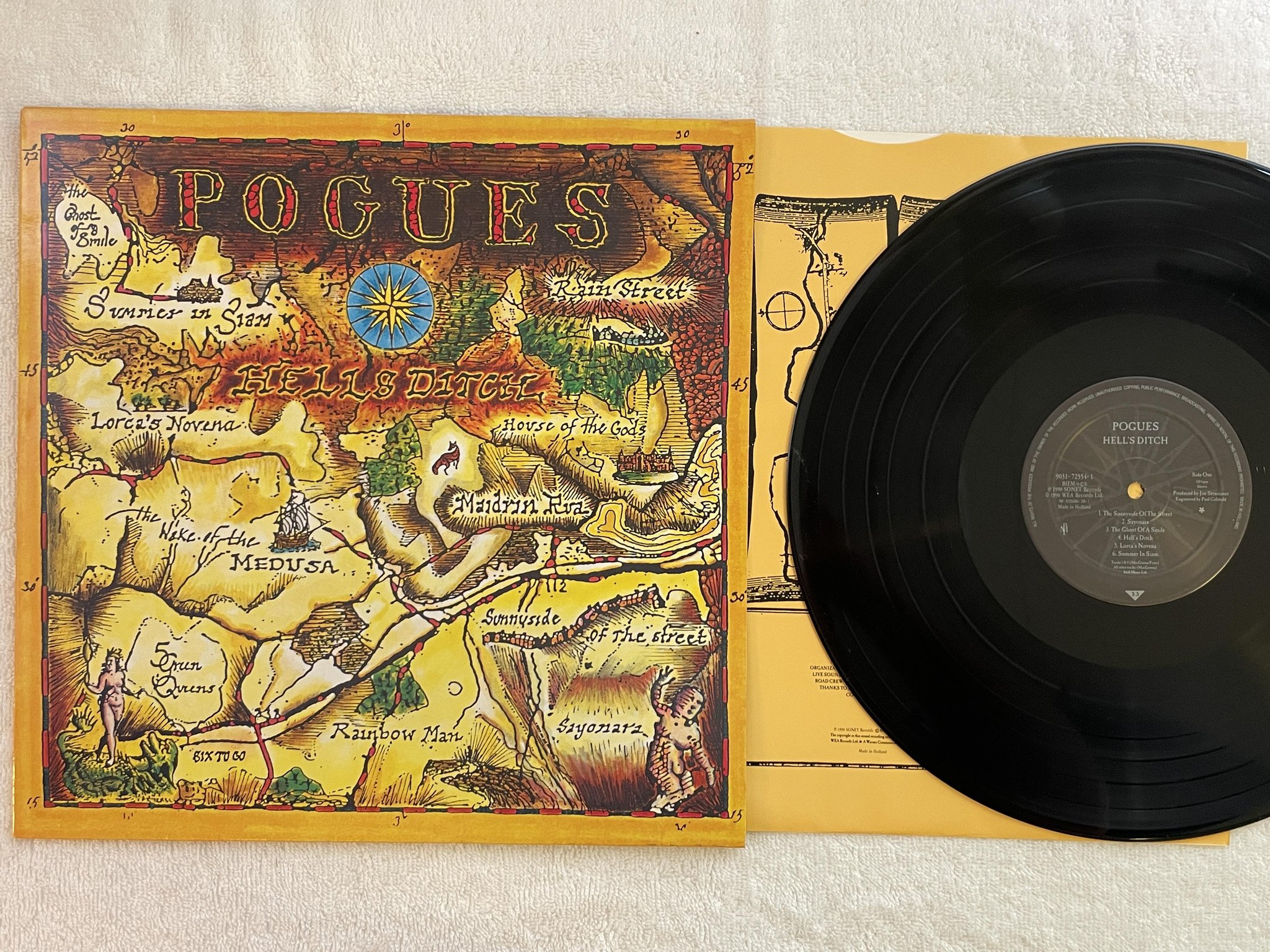 Omslagsbild för skivan THE POGUES Hell's Ditch LP -88 Hol POGUE MAHONE 9031-72554-1