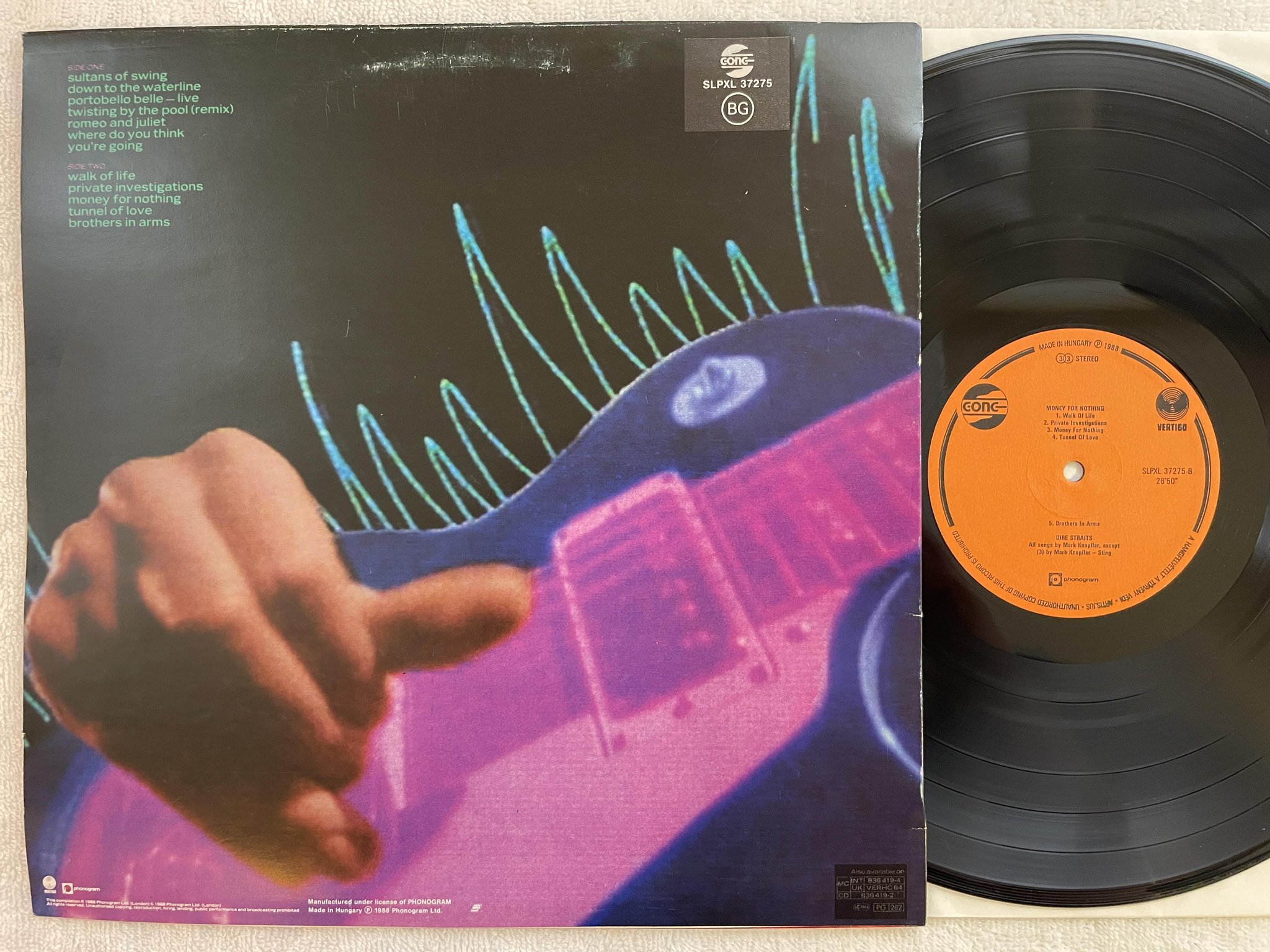Omslagsbild för skivan DIRE STRAITS money for nothing LP -88 Hungary GONG SLPXL 37275