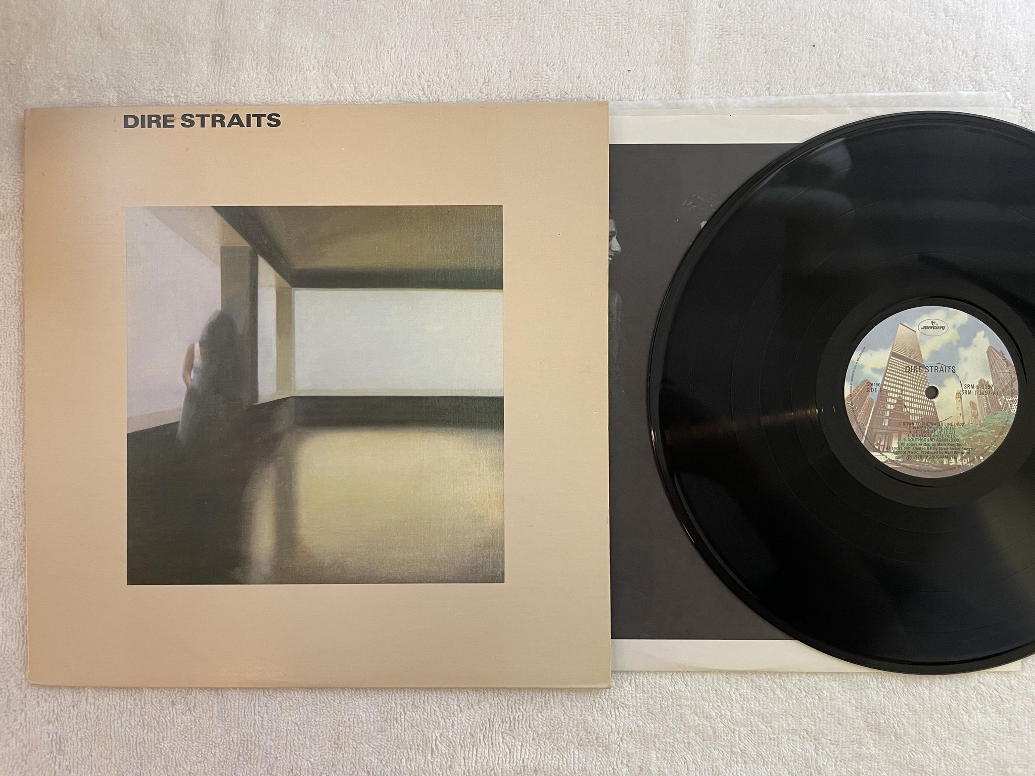 Omslagsbild för skivan DIRE STRAITS s/t LP -78 Can MERCURY SRM-1-1197