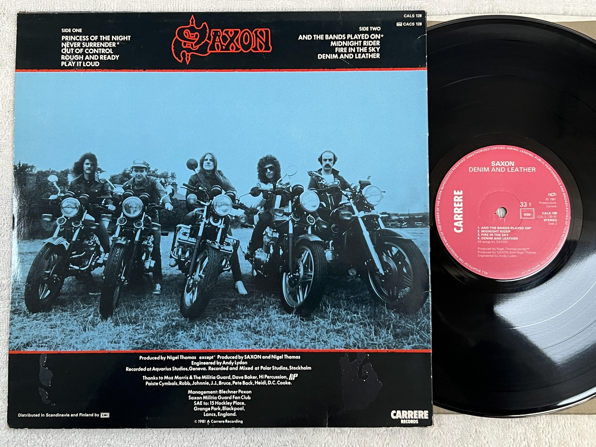 Omslagsbild för skivan SAXON denim and leather LP -81 ncb CARRERE CALS 128