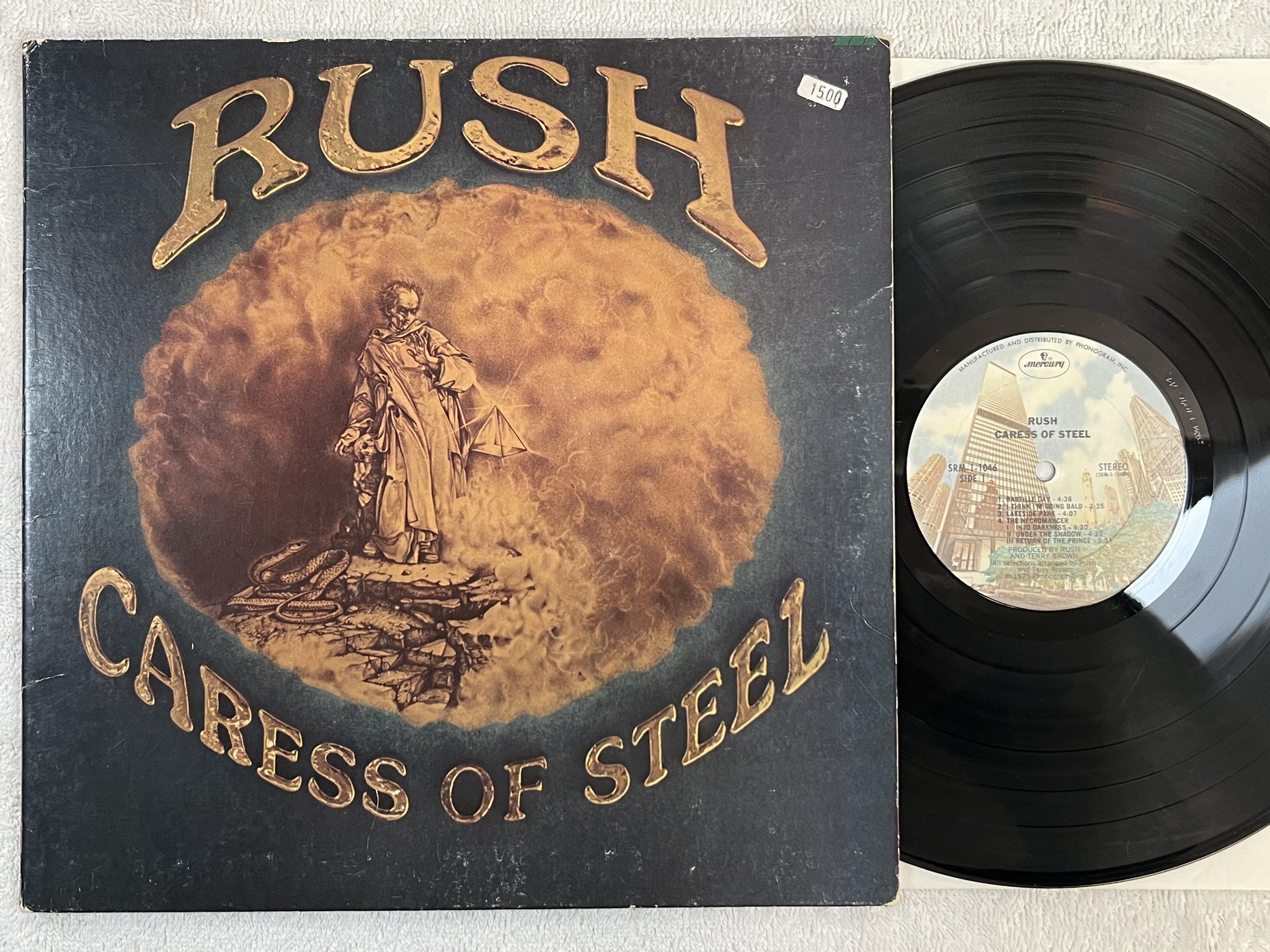 Omslagsbild för skivan RUSH caress of steel LP -75 US MERCURY SRM-1-1046