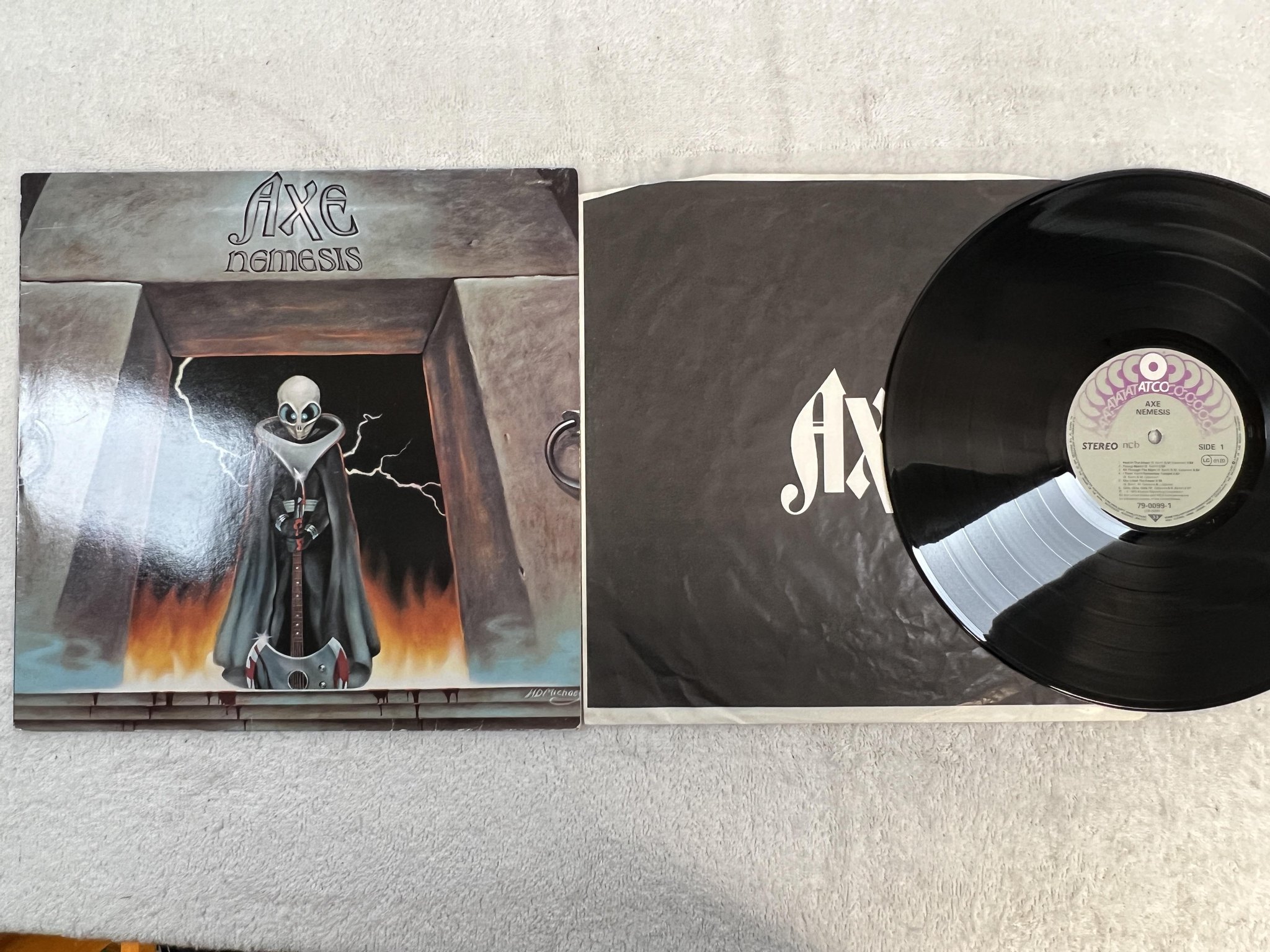 Omslagsbild för skivan AXE nemesis LP -83 ncb ATCO 79-0099-1
