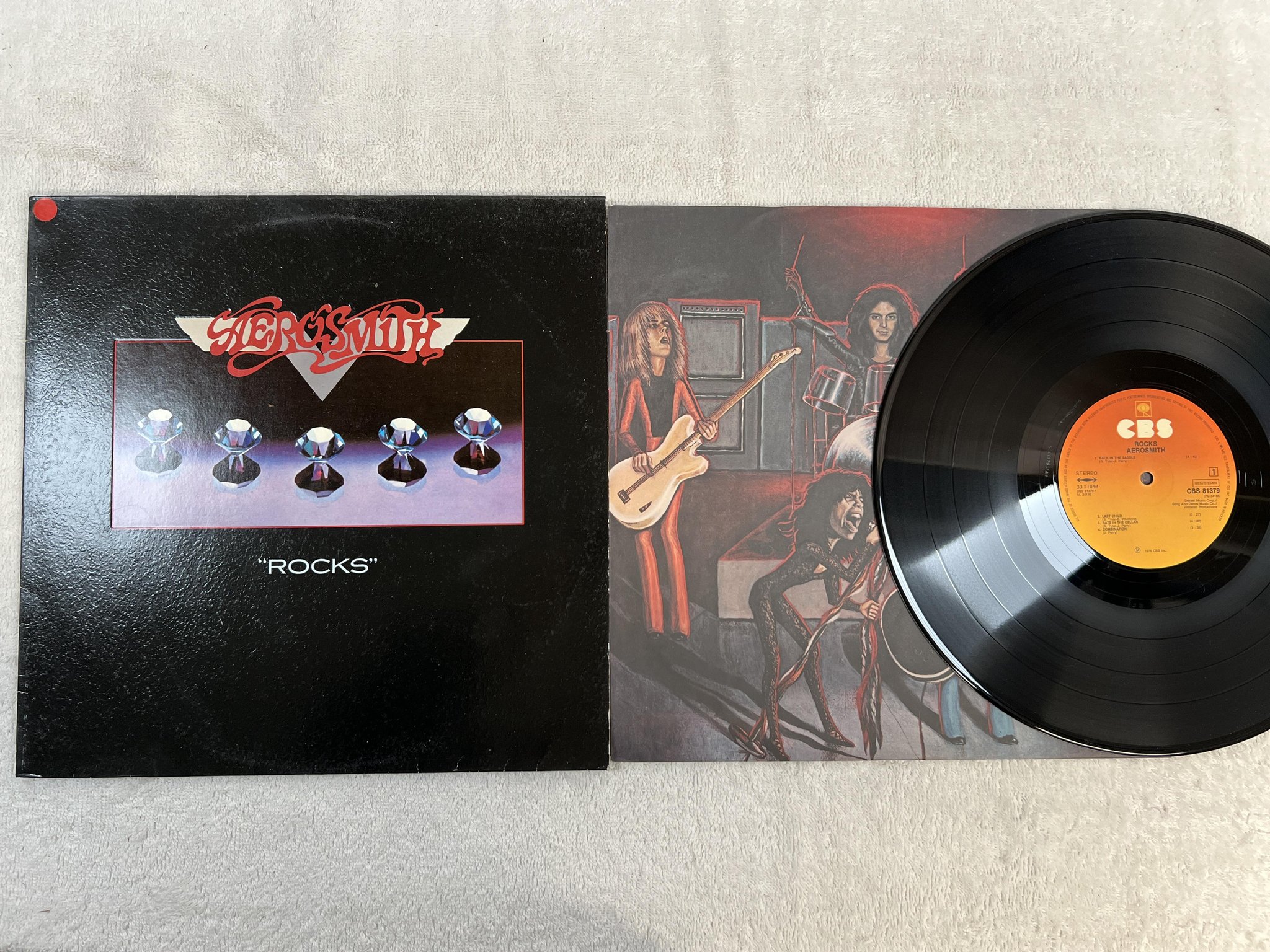 Omslagsbild för skivan AEROSMITH rocks LP -76 Hol S CBS 81379