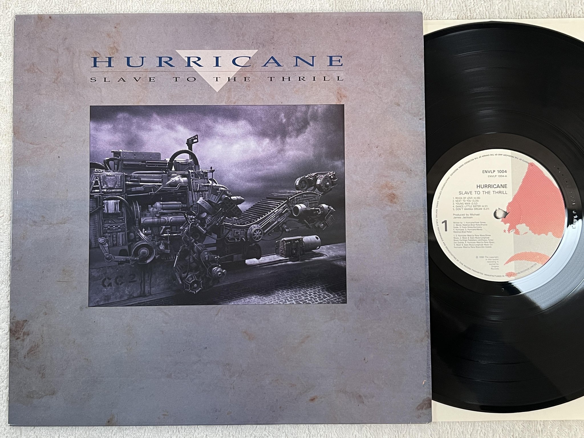 Omslagsbild för skivan HURRICANE slave to the thrill LP -90 UK ENIGMA ENVLP 1004
