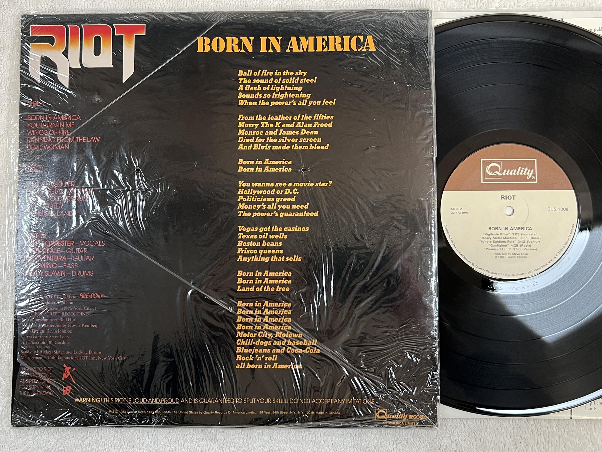 Omslagsbild för skivan RIOT born in America LP -83 Can QUALITY QUS 1008