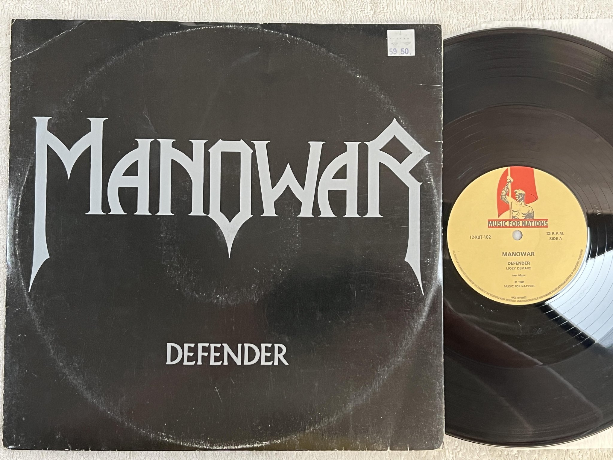 Omslagsbild för skivan MANOWAR defender 12" -83 MUSIC FOR NATIONS 12 KUT 102 *** 33 R.P.M. On Labels **