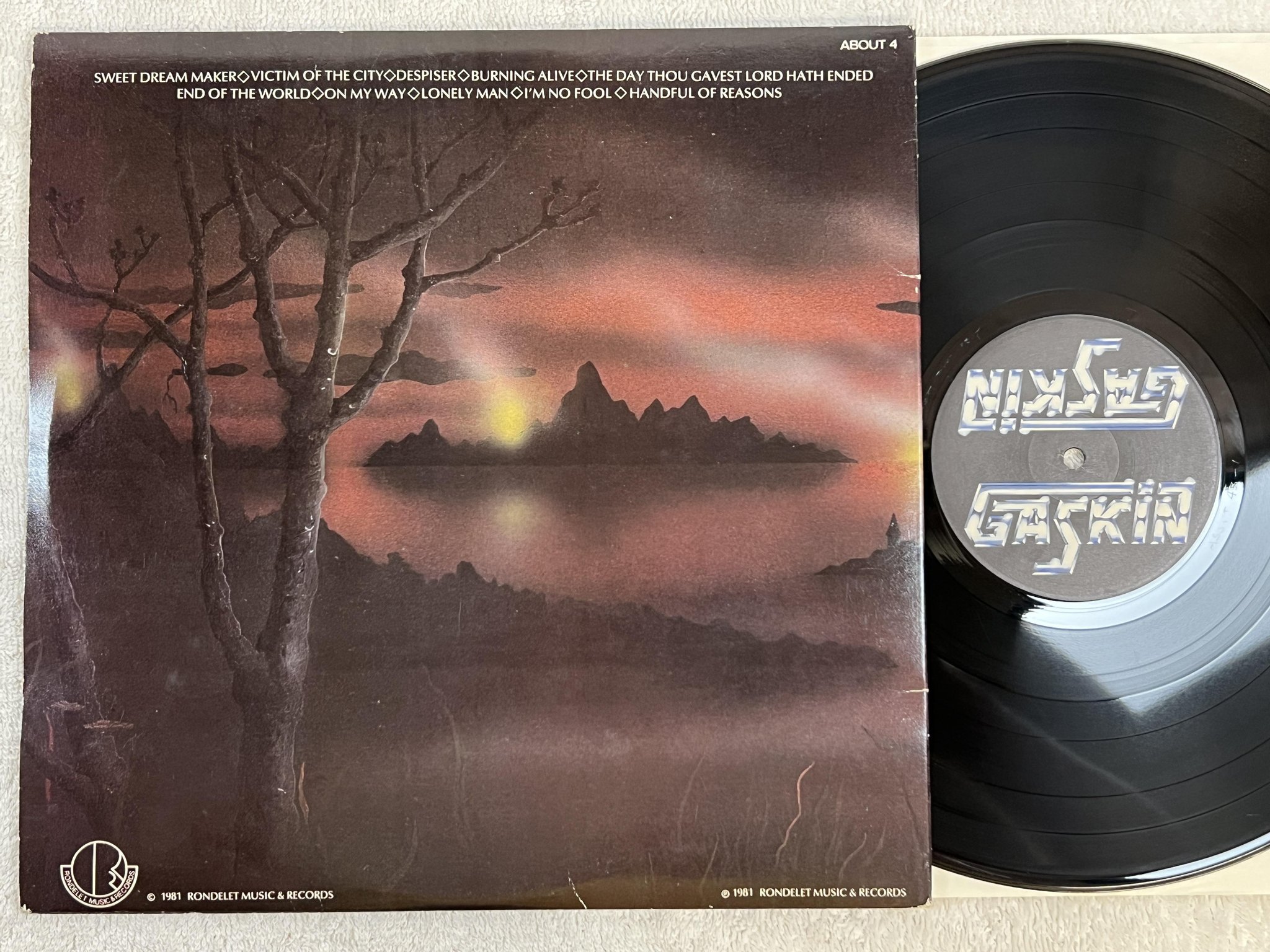 Omslagsbild för skivan GASKIN end of the world LP -81 UK RONDOLET MUSIC ABOUT 4