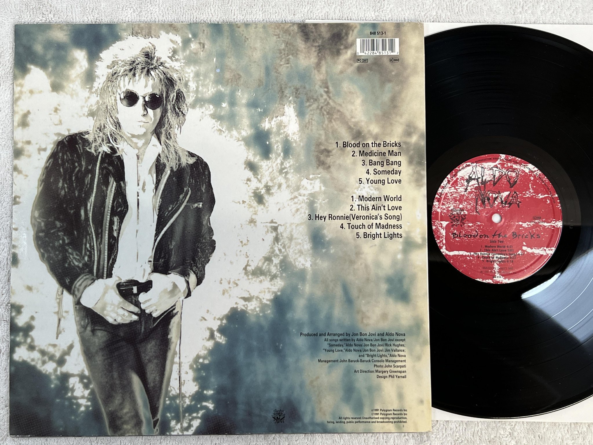 Omslagsbild för skivan ALDO NOVA Blood On The Bricks LP -91 jambco 848 513-1