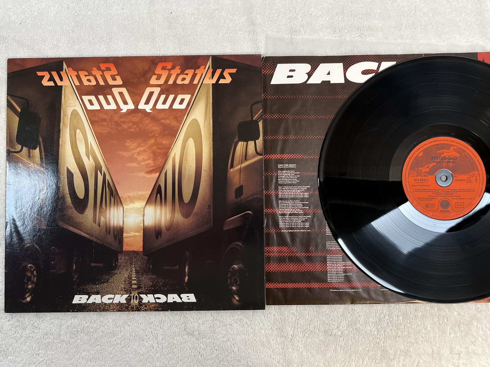 Omslagsbild för skivan STATUS QUO back to back LP -83 Ger VERTIGO 814662-1