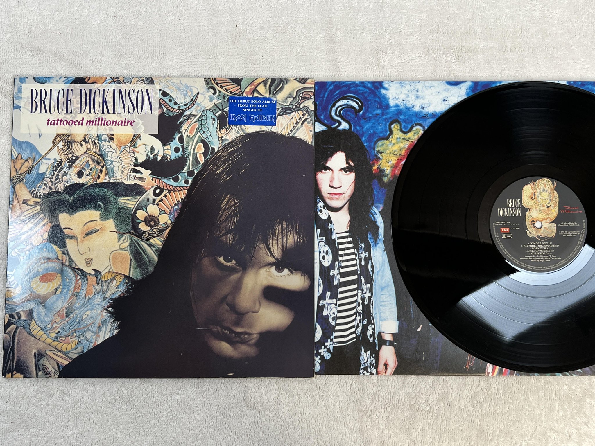 Omslagsbild för skivan BRUCE DICKINSON tattooed millionaire LP -90 EMI 064-7942731