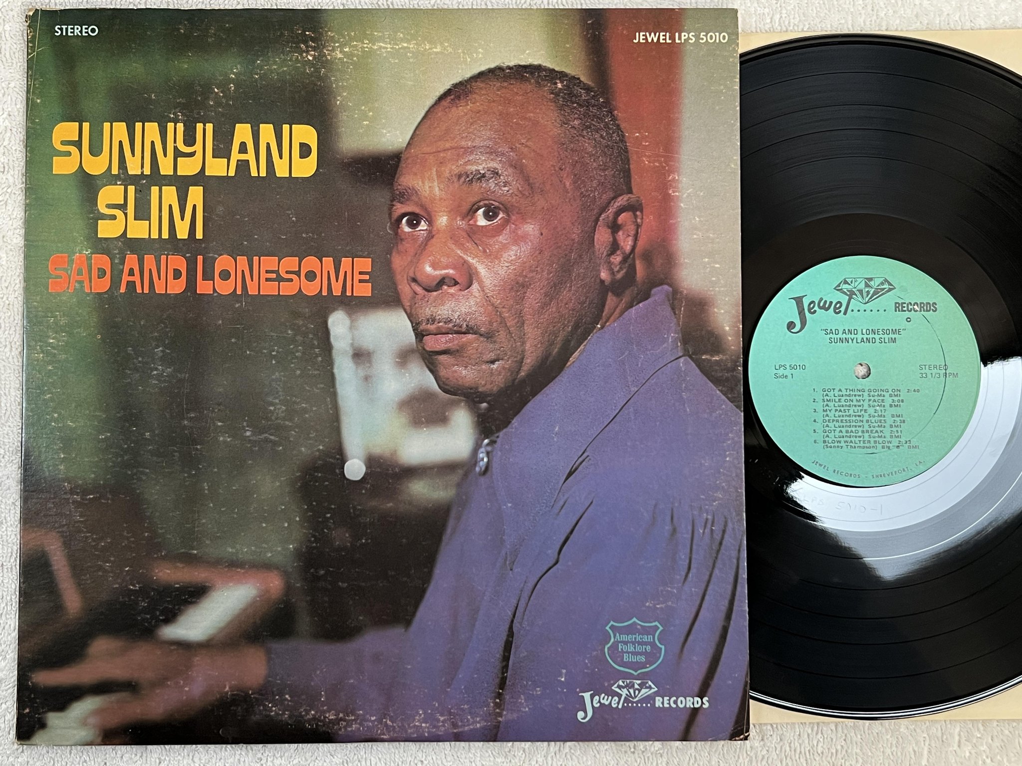 Omslagsbild för skivan SUNNYLAND SLIM Sad And Lonesome LP -72 US JEWEL LPS 5010