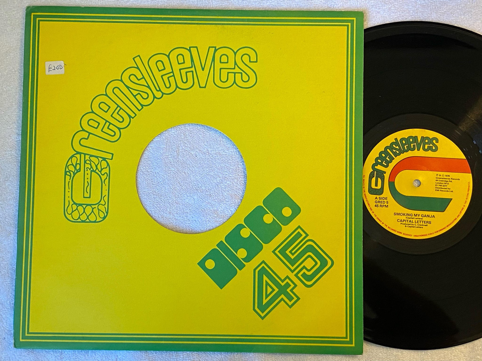 Omslagsbild för skivan CAPITAL LETTERS smoking my ganja 12"Single -78 UK GREENSLEEVES GRED 5
