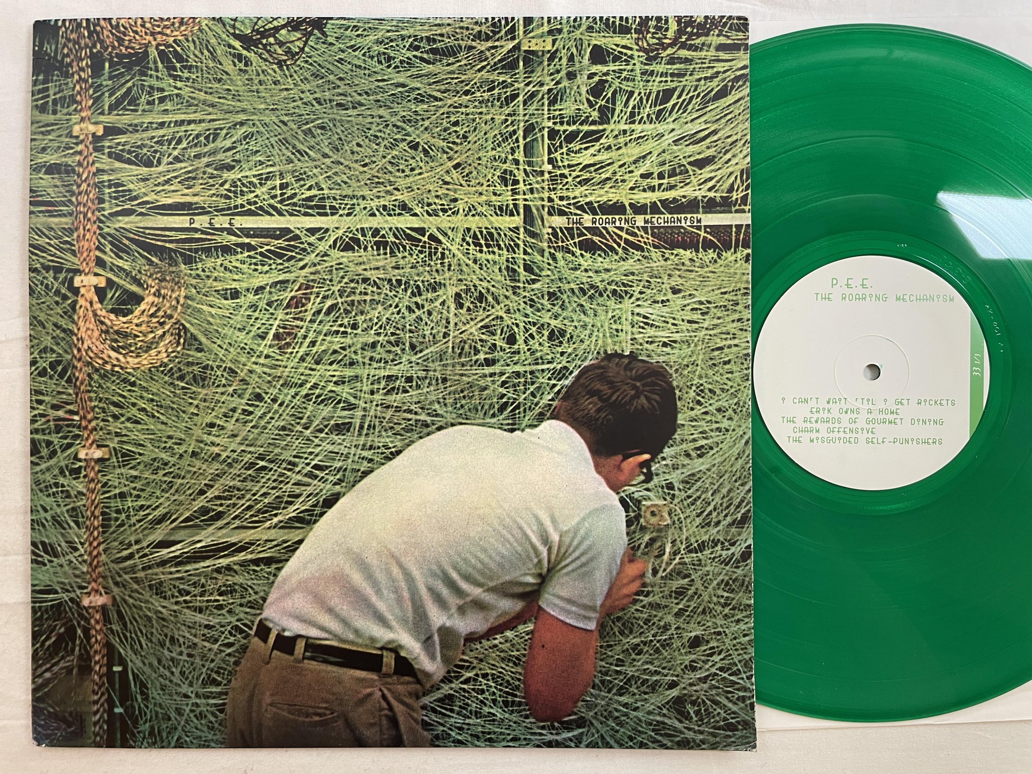 Omslagsbild för skivan P.E.E. the roaring mechanism LP -98 US ABSOLUTELY KOSHER AK-001