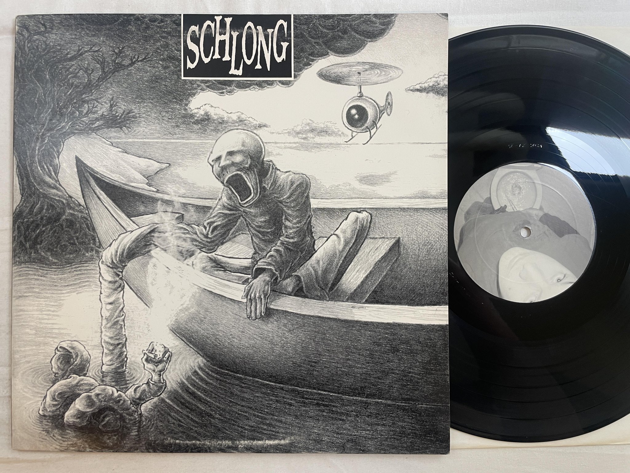 Omslagsbild för skivan SCHLONG Squatting On The Pot 12"ep -91 US VERY SMALL VSR 21